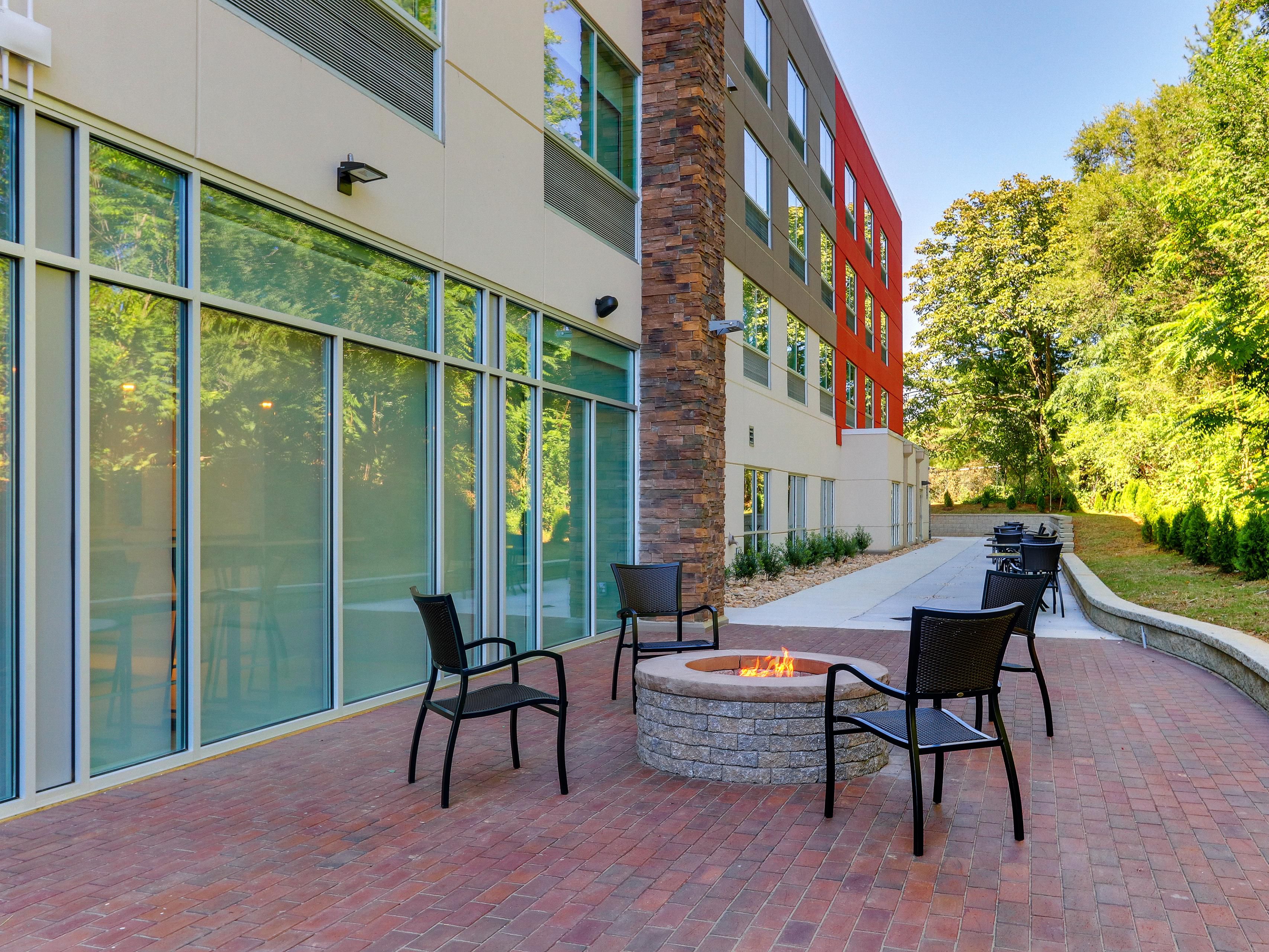 Our outdoor patio and fire pit area are open for your enjoyment! It's time for some fresh air conversations around the fire pit with friends, family or colleagues! We're confident you'll love our outdoor space.
