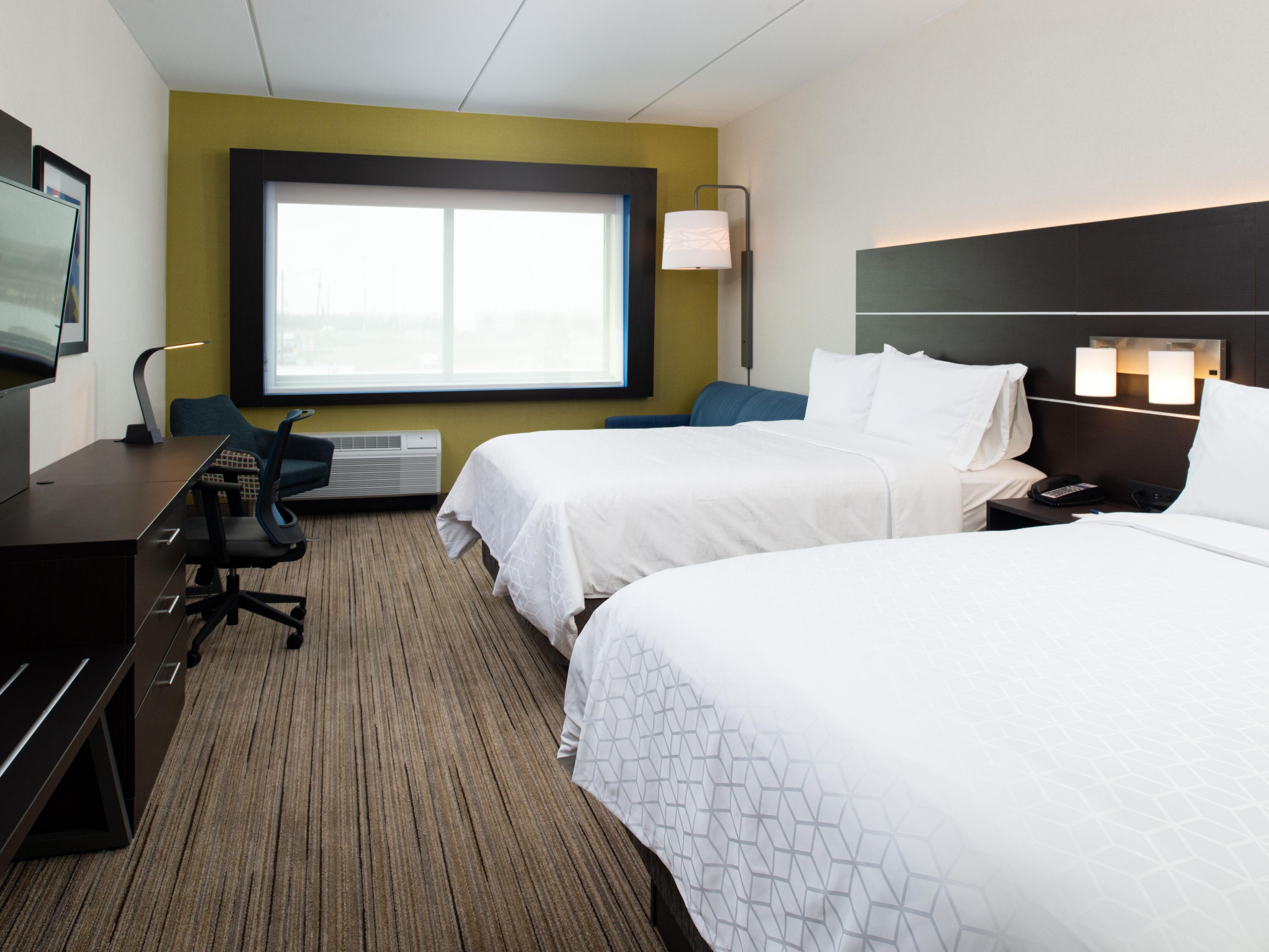 Relax and spread out  in our brand new, well-appointed suites. Call the front desk today!