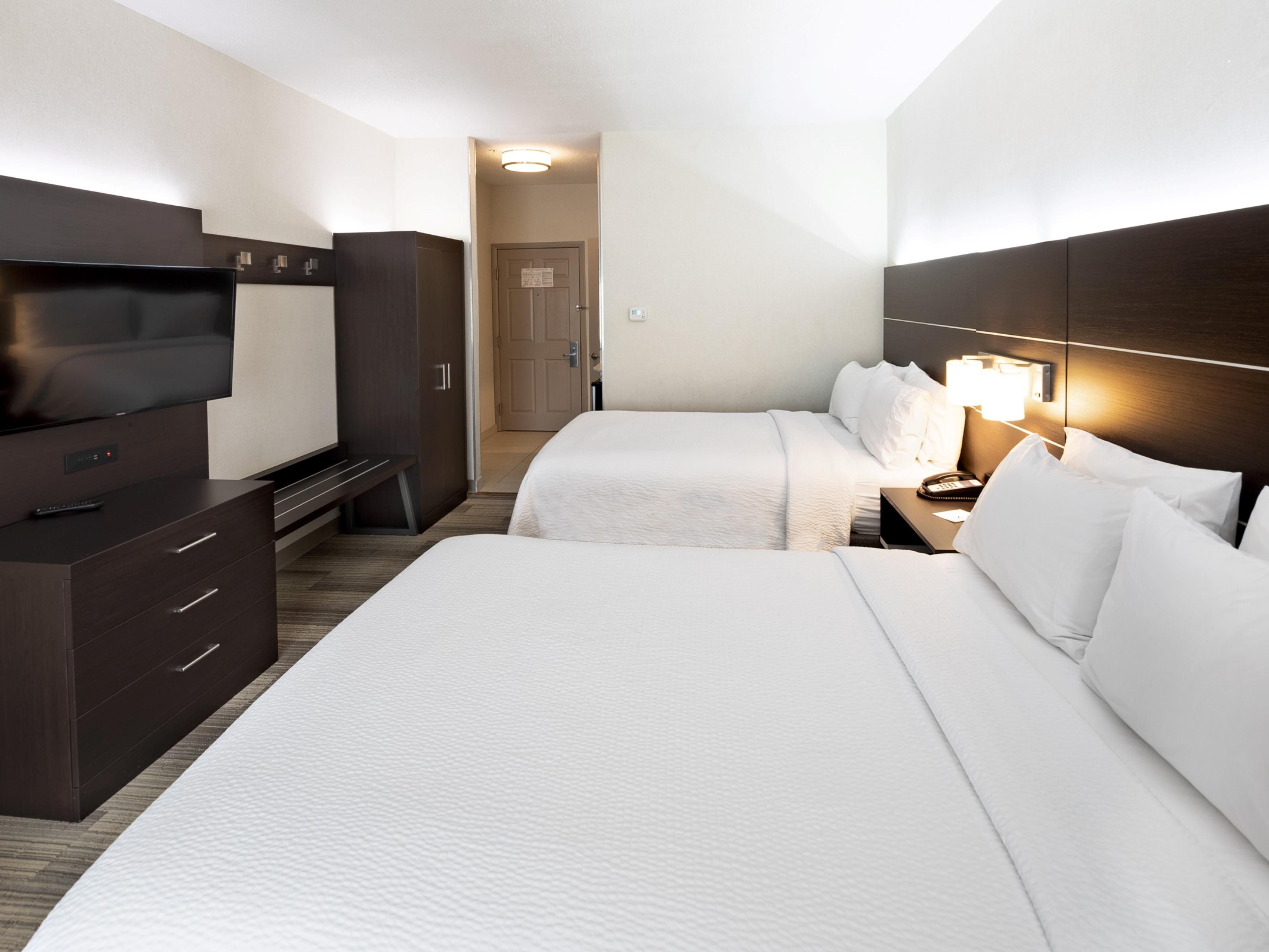 Comfort and accessibility in our 2 Queen Suite with tub!