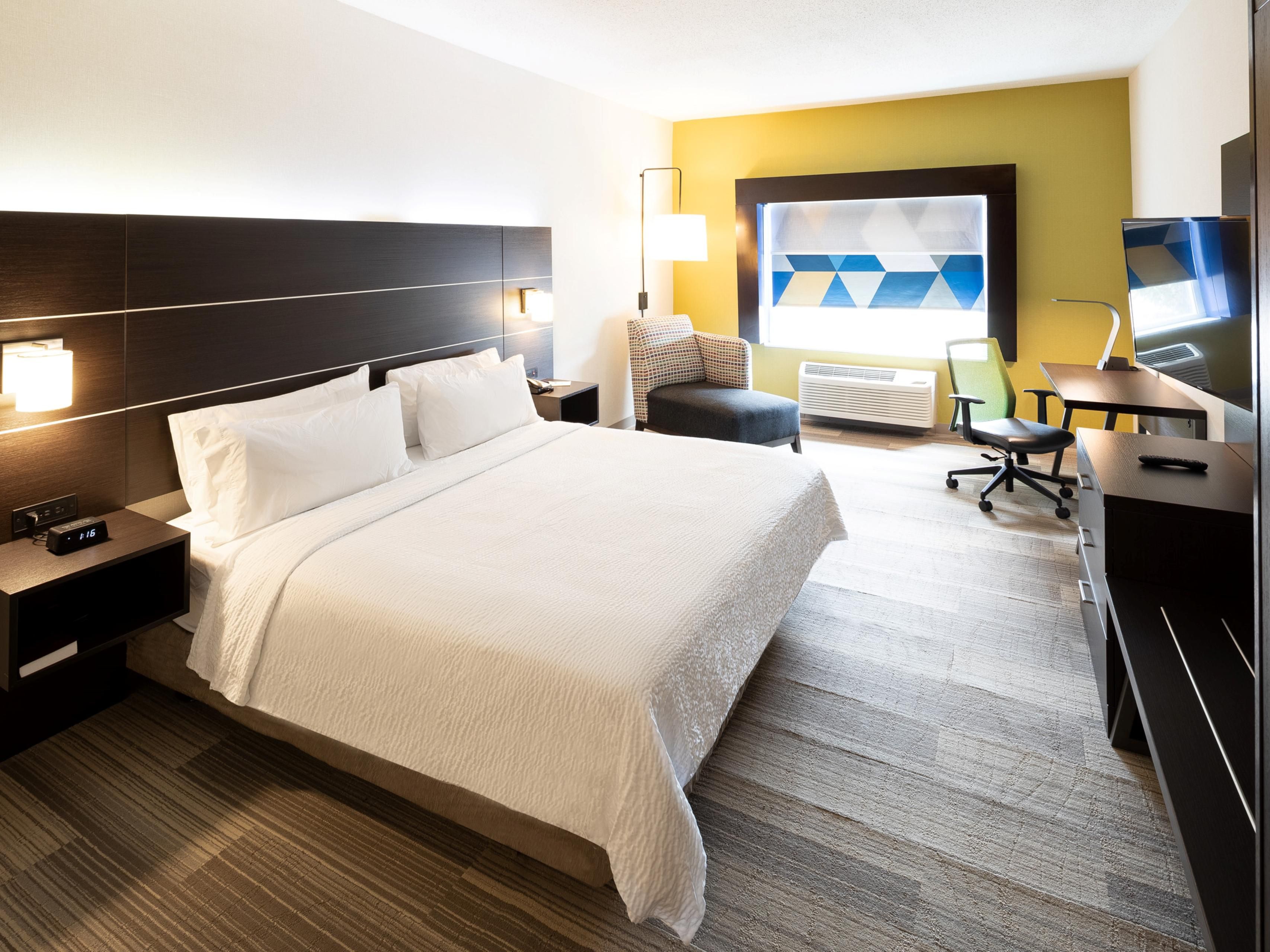 Stay in our king room, mobility accessible with a roll-in shower.