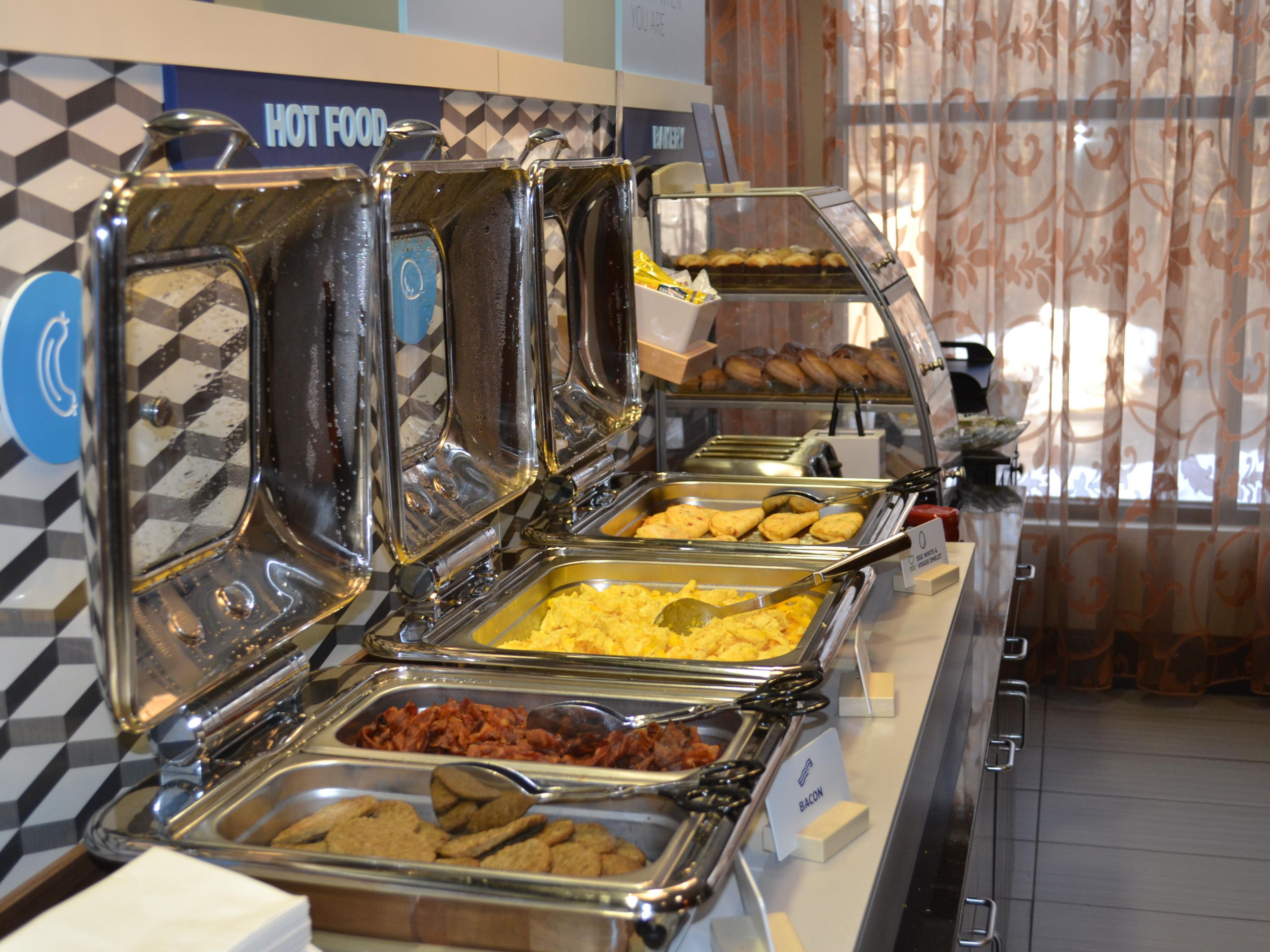 Enjoy a relaxing nights stay at our award winning Holiday Inn Express & Suites hotel and wake up to our Express START™ complimentary hot buffet breakfast in the morning. It's fresh, hot, and free.