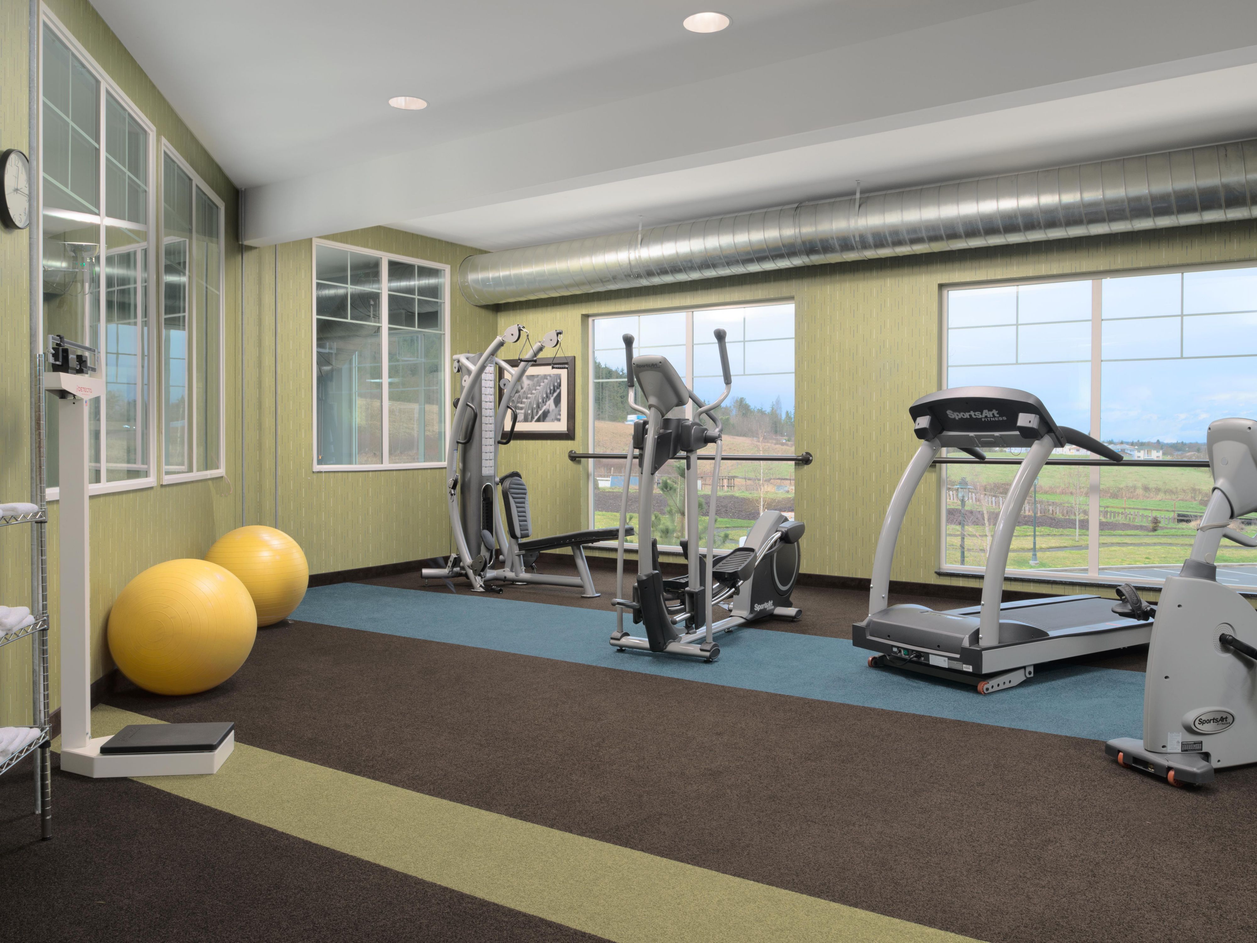 Fitness center with a variety of equipment and great views