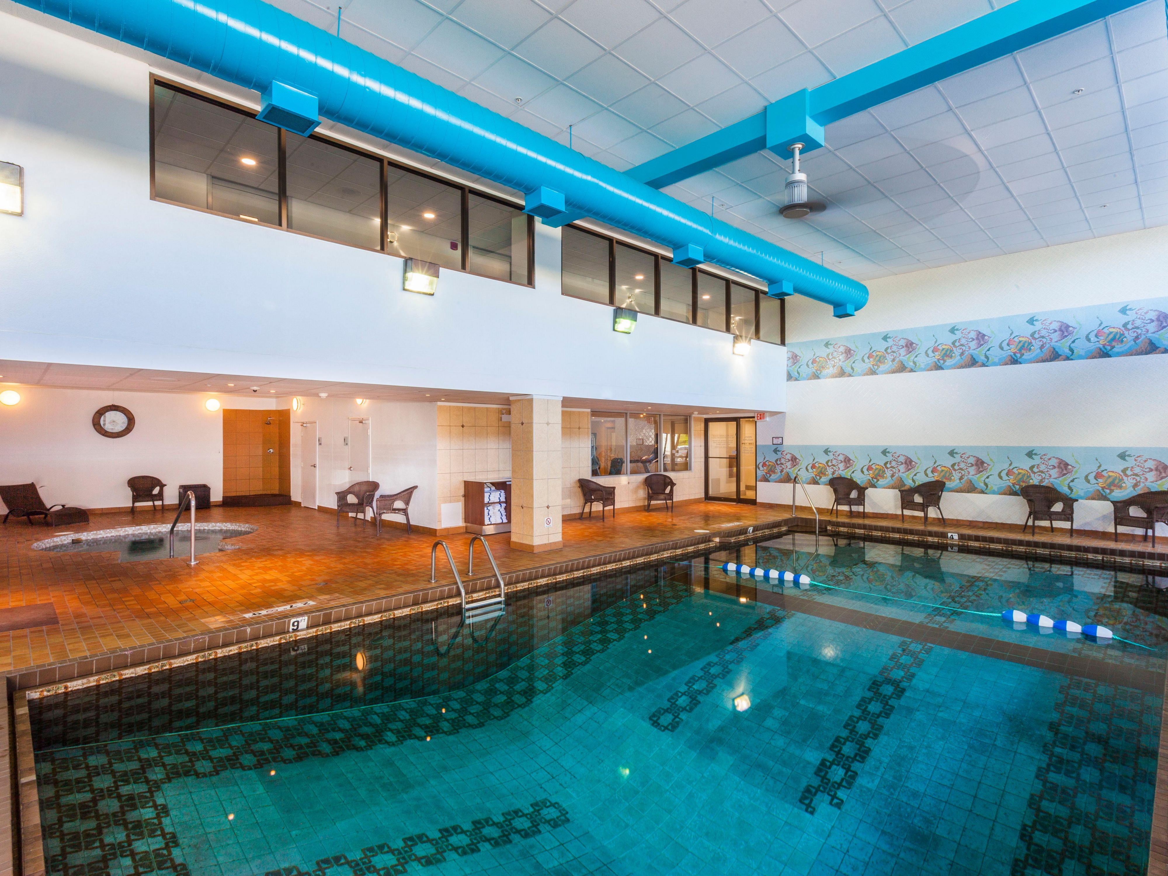 Relax In Our Large Indoor Heated Swimming Pool and Hot Tub