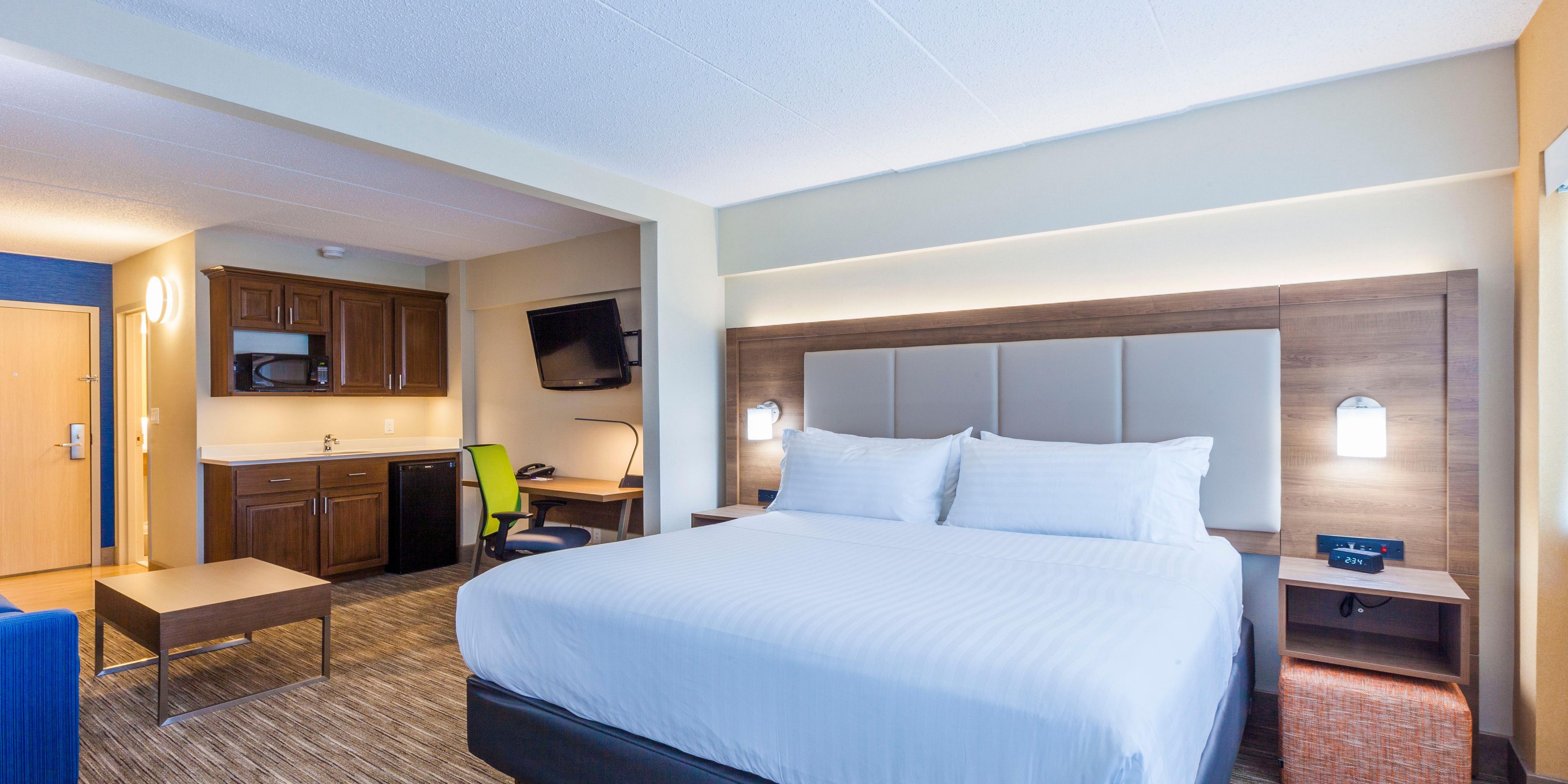 Check out our King Suites - designed with comfort and efficiency in mind, these contemporary rooms include a King bed, mini-fridge, microwave, full workstation with complimentary ultra high-speed Wi-Fi and two flat screen HDTV's.