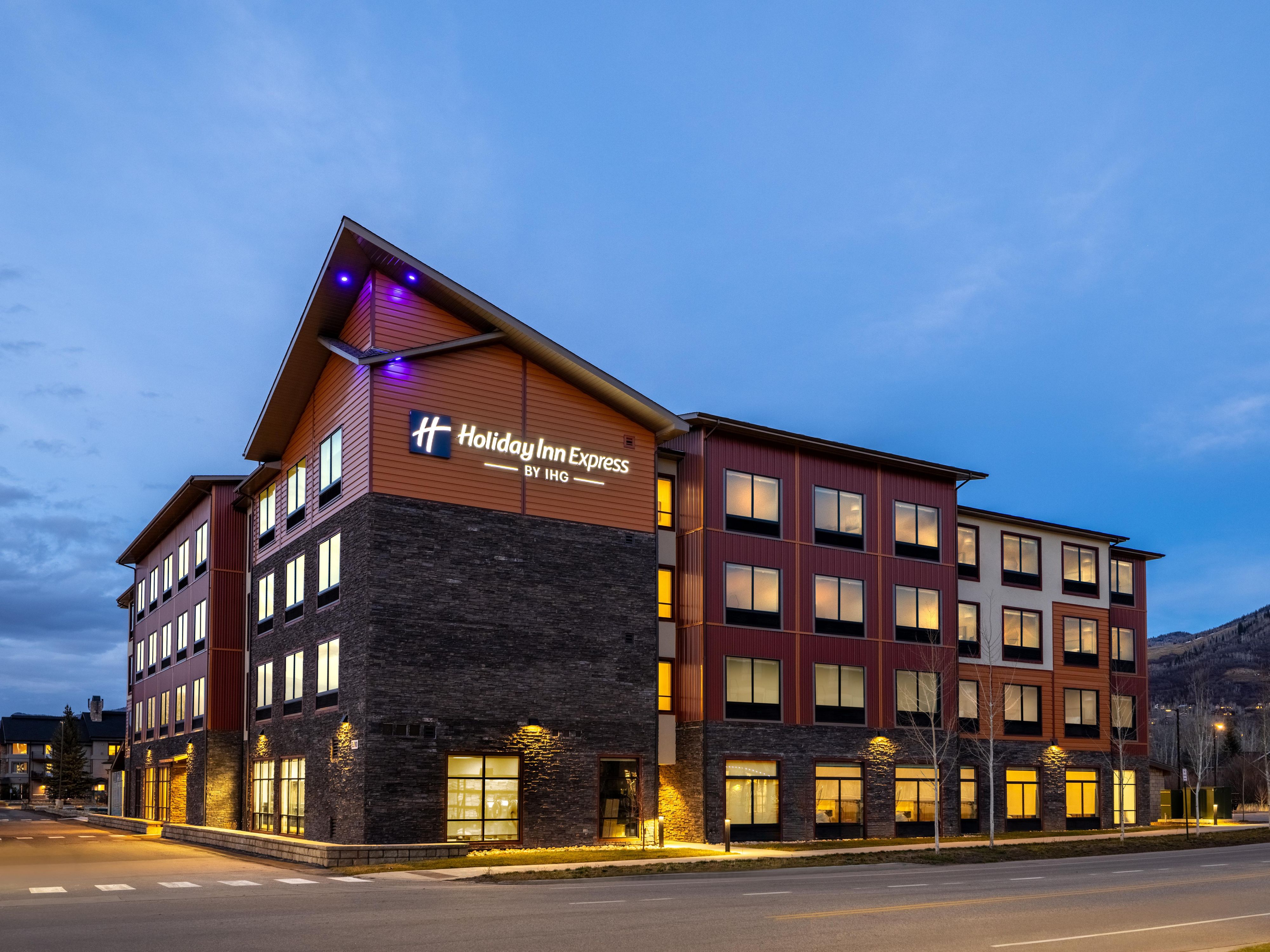 Exterior view of hotel at dusk