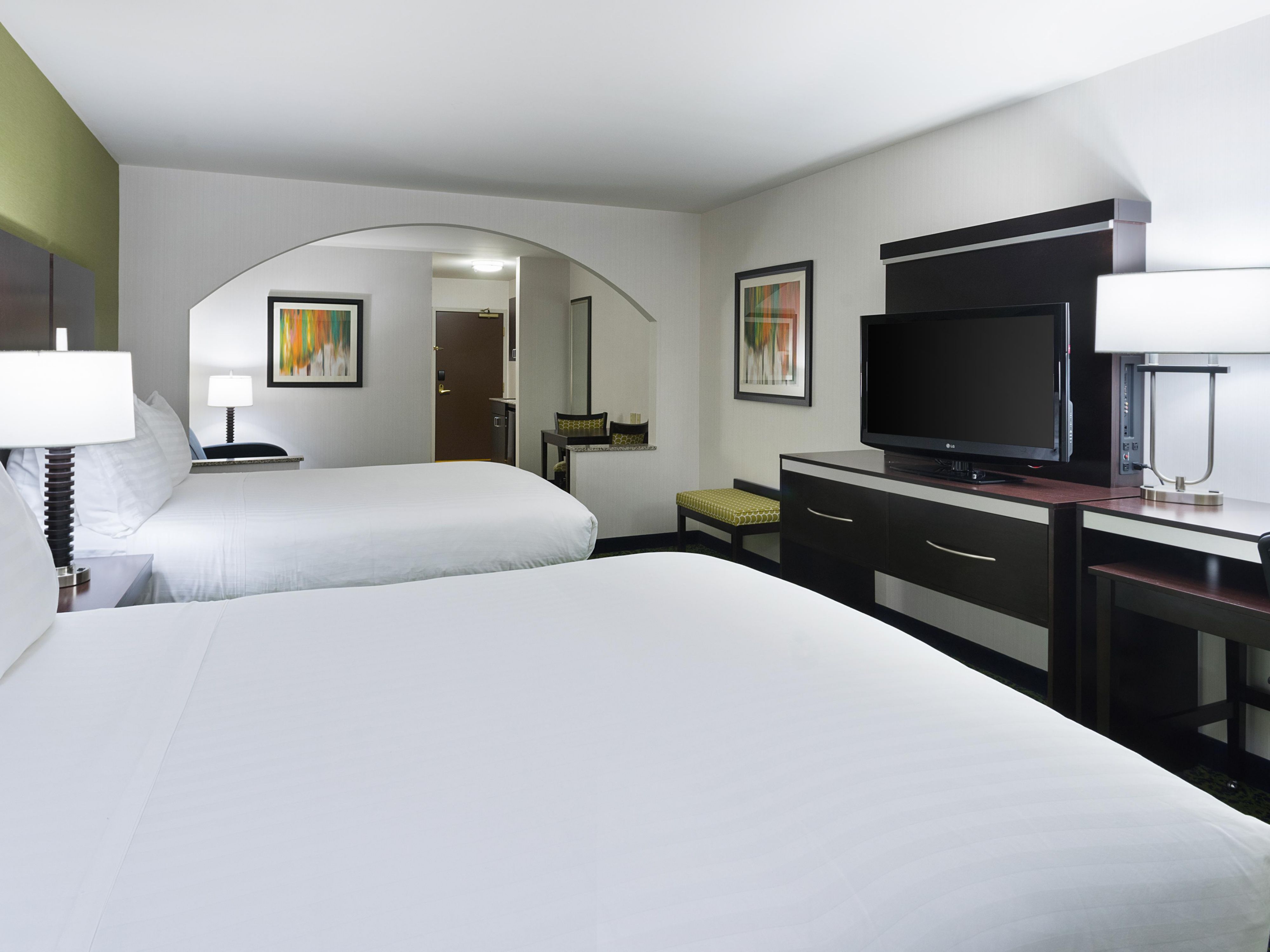Book a room with Two Queen Beds perfect for friends and family.