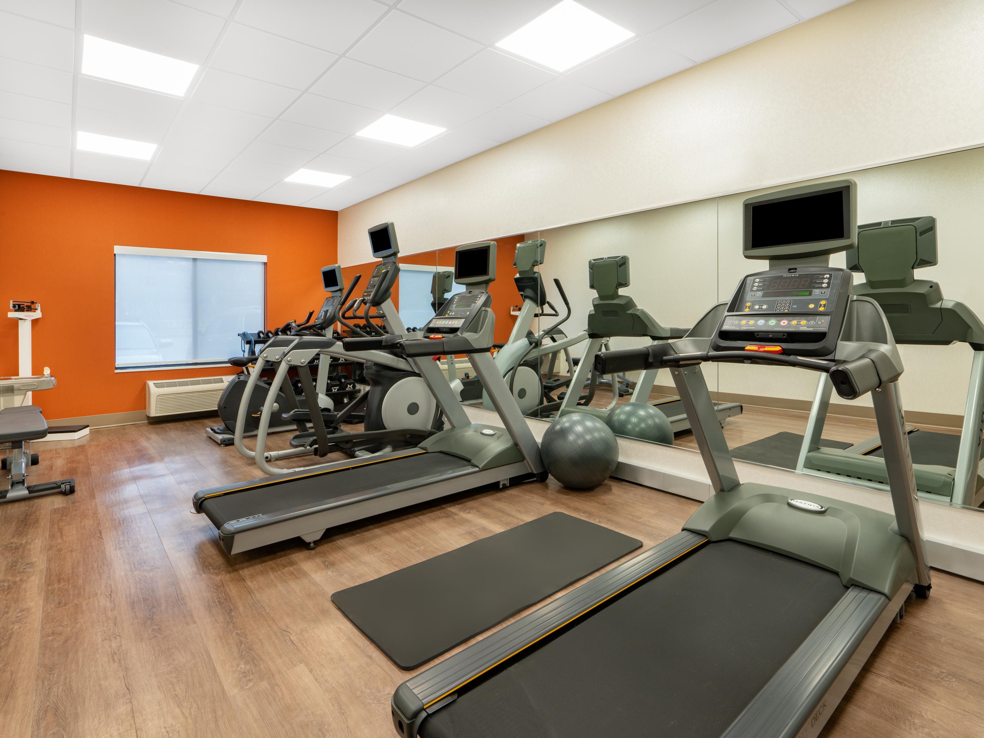 Stay fit and energized in our fully equipped gym.