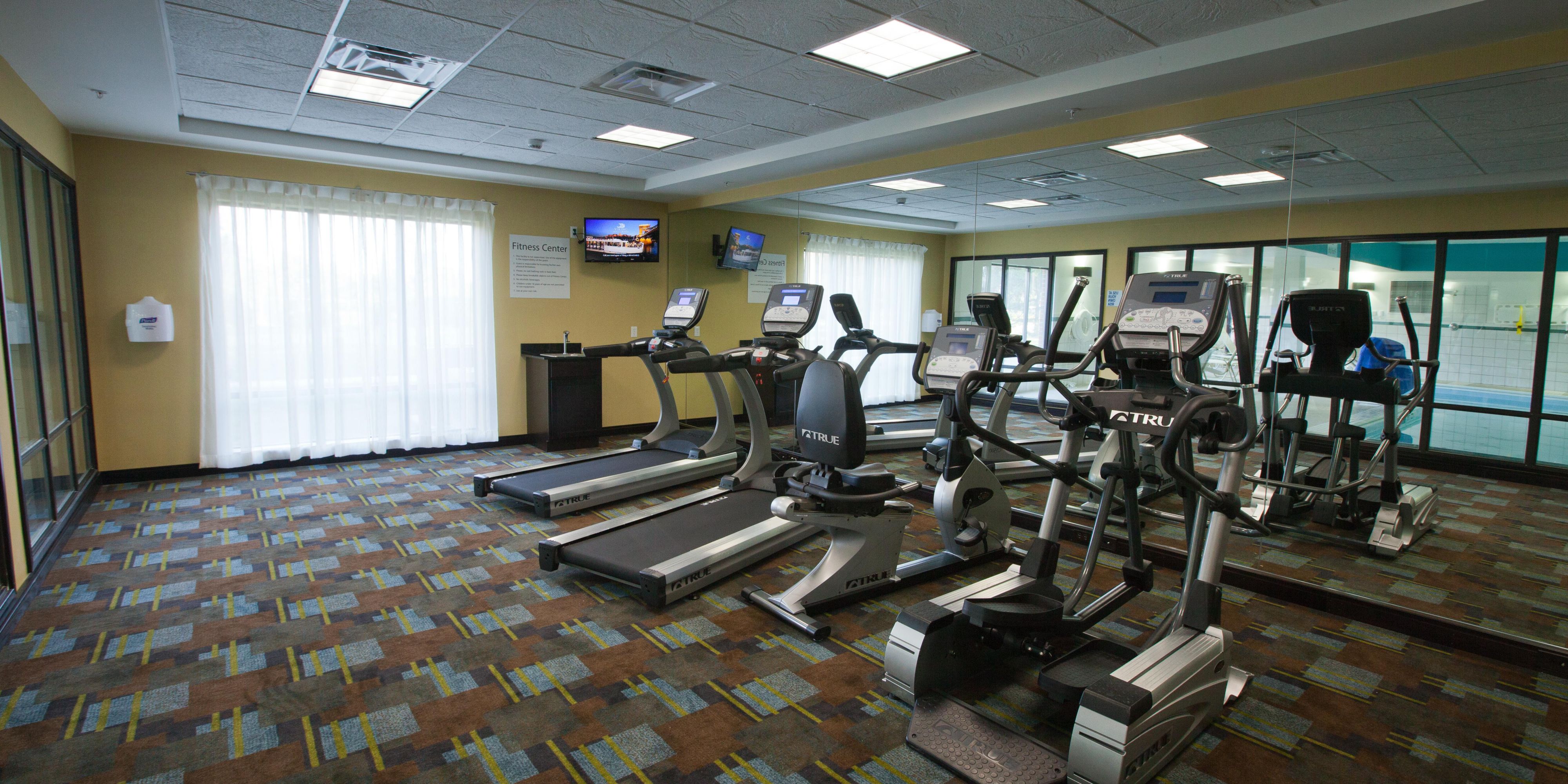 Start your day off feeling your best with our equipment (Equip. may vary from photo). We have a treadmill and an elliptical that include their own individual television screens so you can choose what you watch while you work out! Hand weights, yoga mats and medicine balls are available in our open workout area. 