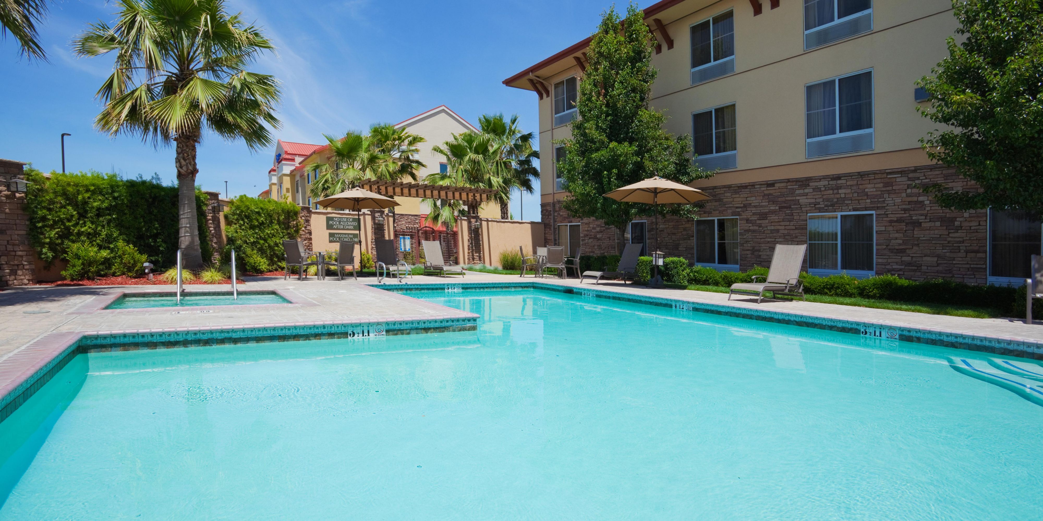 Holiday Inn Express, Turlock has the BEST and Largest pool compared to other hotels! Our pool and spa is surrounded by tall Palm Trees - giving our guests a feeling of a Tropical vacation while visiting the Central Valley! Protective concrete walls keeps our pool area restricted and private. Book your next stay and enjoy our crystal clear pool!