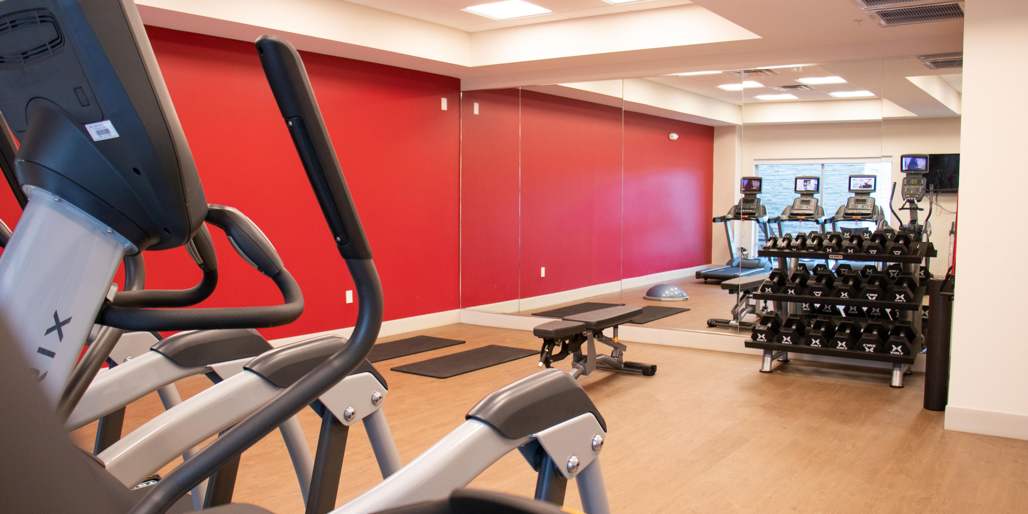 Keep active even when on the road. Our fitness center is equipped with treadmills, ellipticals and stationary bike. The open area allows for functional fitness and weight training. Enjoy the natural light and view of the outdoor pool.