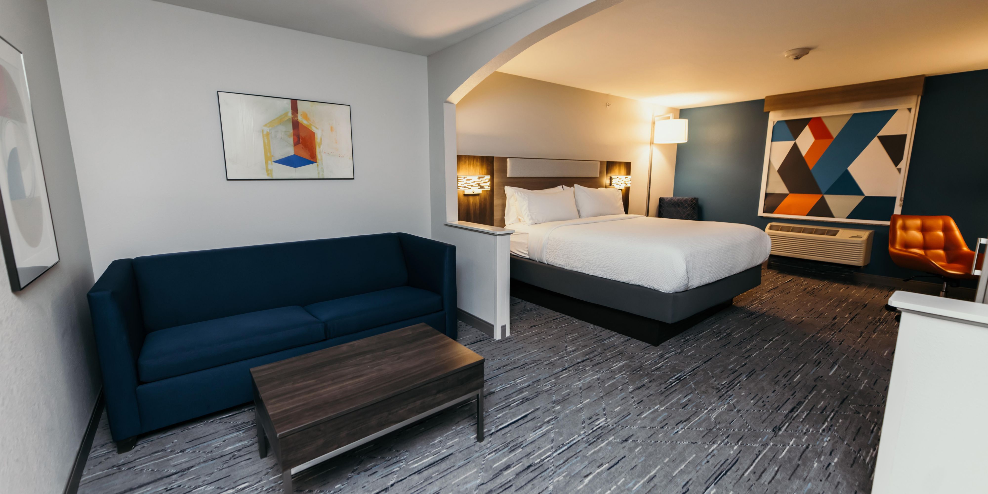 Our spacious suites are ideal for families or extended stays. Each suite features a separate setting area with a pull-out sofa, a full workstation so that you can stay productive on the road, a Keurig coffee maker, microwave, mini-fridge, and HDTV. All of our guest rooms have complimentary Wi-Fi and our full hot breakfast buffet each morning.