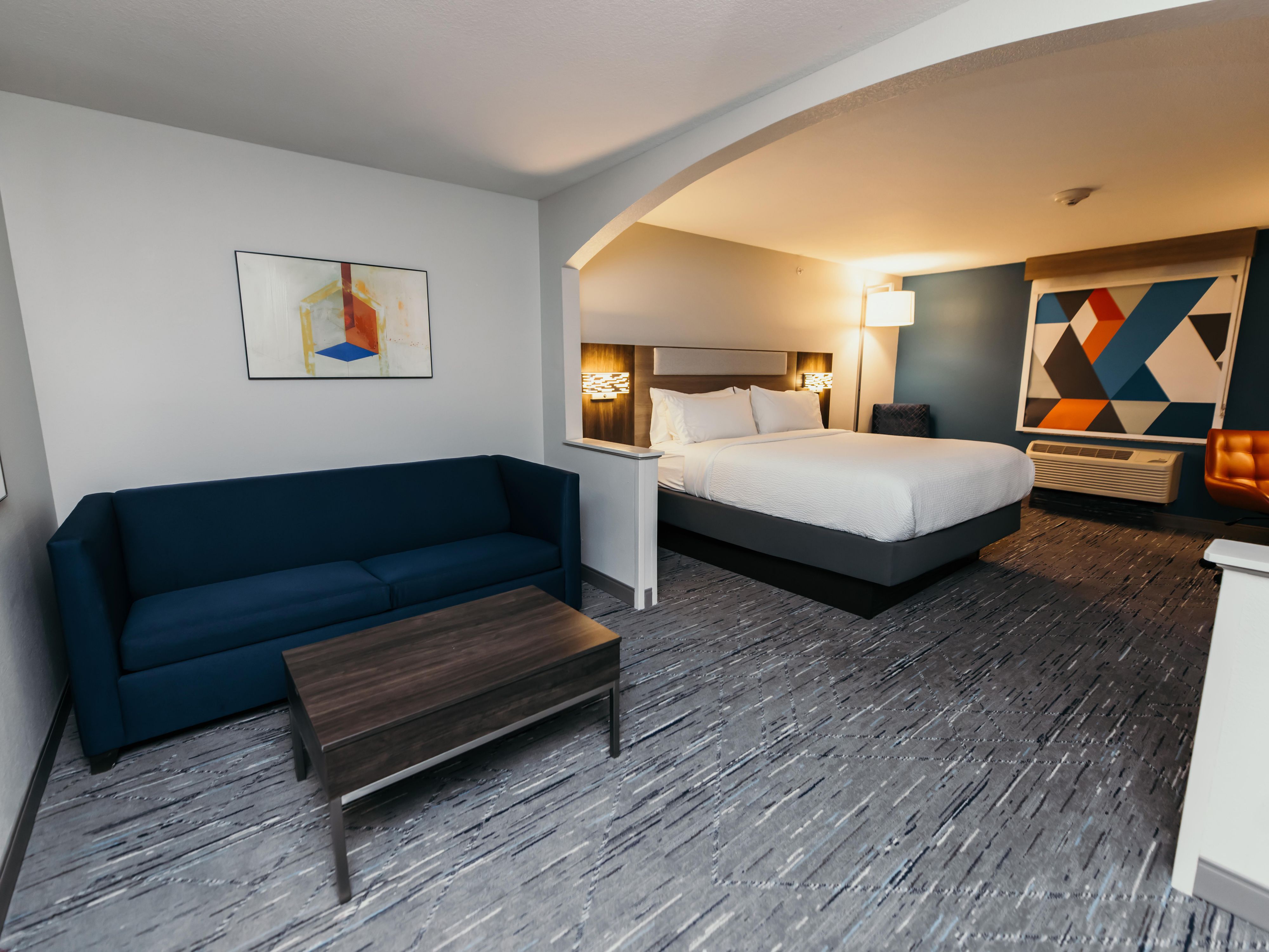 Our spacious suites are ideal for families or extended stays. Each suite features a separate setting area with a pull-out sofa, a full workstation so that you can stay productive on the road, a Keurig coffee maker, microwave, mini-fridge, and HDTV. All of our guest rooms have complimentary Wi-Fi and our full hot breakfast buffet each morning.