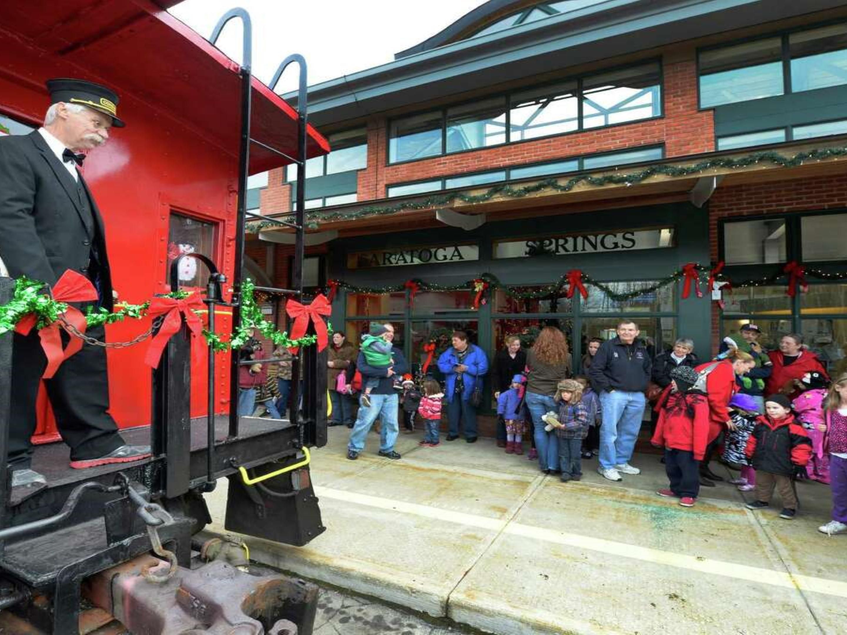 Live the magic of the classic Polar Express™ Train Ride story with the Adirondack Railroad. Depart from Utica’s Union Station and travel north while being served hot chocolate and cookies.

When you arrive at the North Pole, Santa will board the train visiting with each family, and giving the first gift of Christmas, the Silver Bell, just like in t