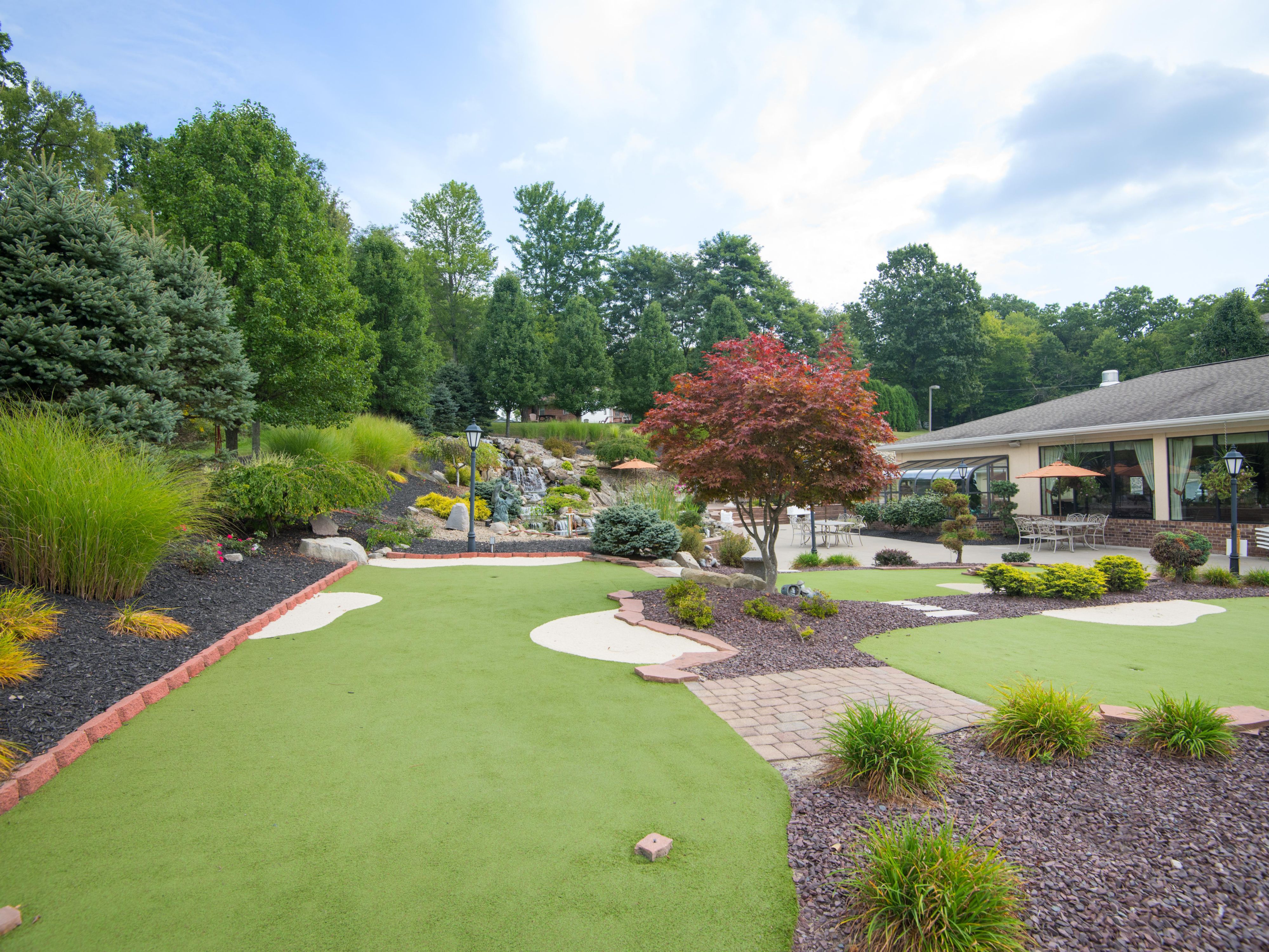 Plan to stay with us and play some of the finest Golf Courses in the area such as Tam O'Shanter, Yankee Run and the Avalon. Afterwards, take time to relax on our 3-hole putting green. The putting greens are nestled between our beautiful waterfall, patio and Koi Pond.