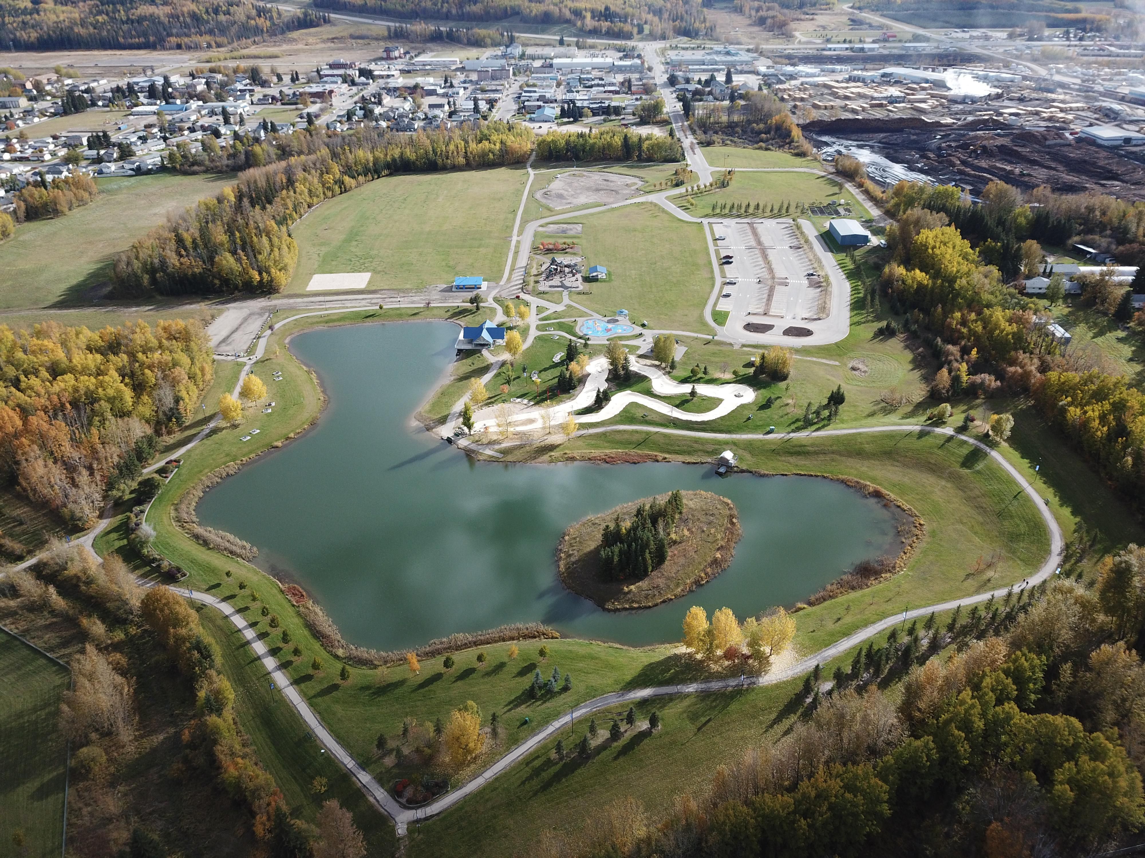 Festival Park features two river slides along with a splash park for the little ones. Picnic areas, walking paths around both the pond and the river, a large playground, changing rooms and bathrooms.