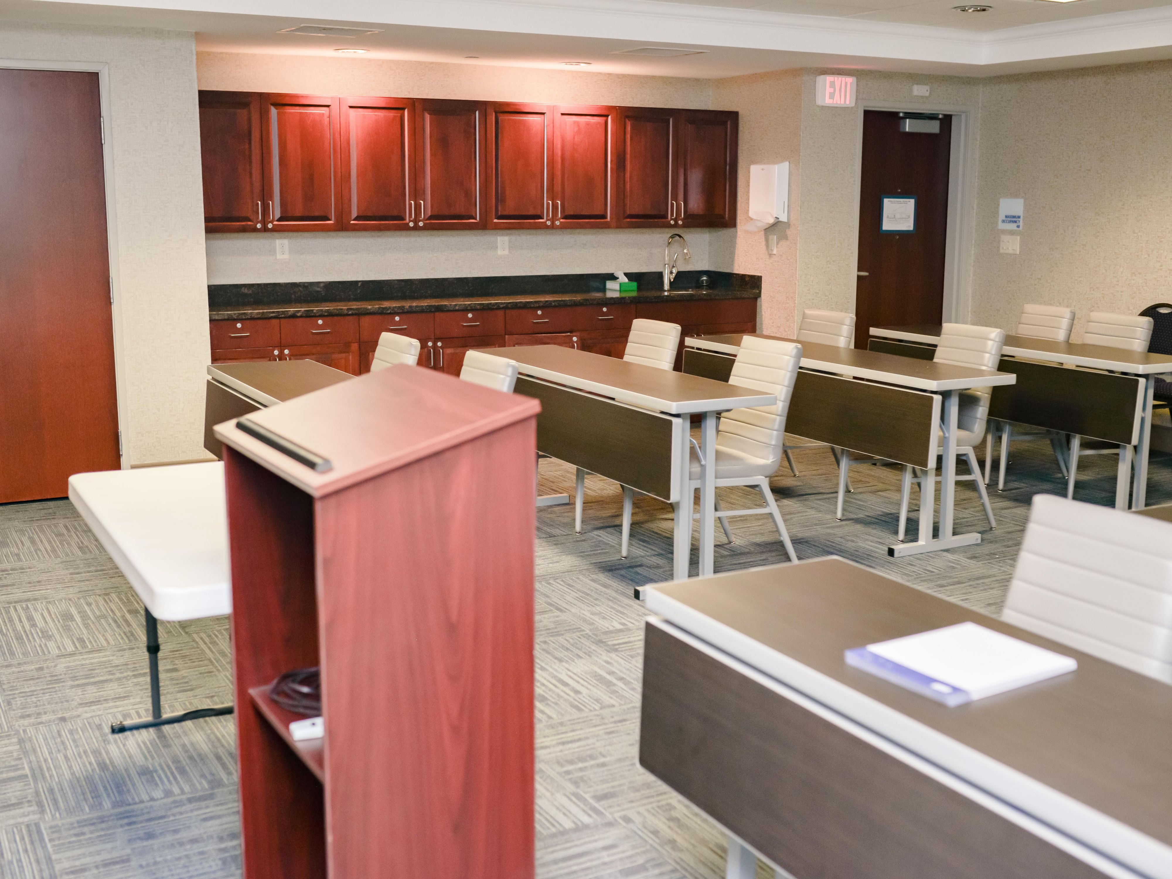 We have the perfect space for small meetings. If you're looking for a location with meeting space, you'll be glad to know that we offer a conference room that can accommodate up to 40 people. Meeting space includes free wireless Internet access and we can also arrange for catering.