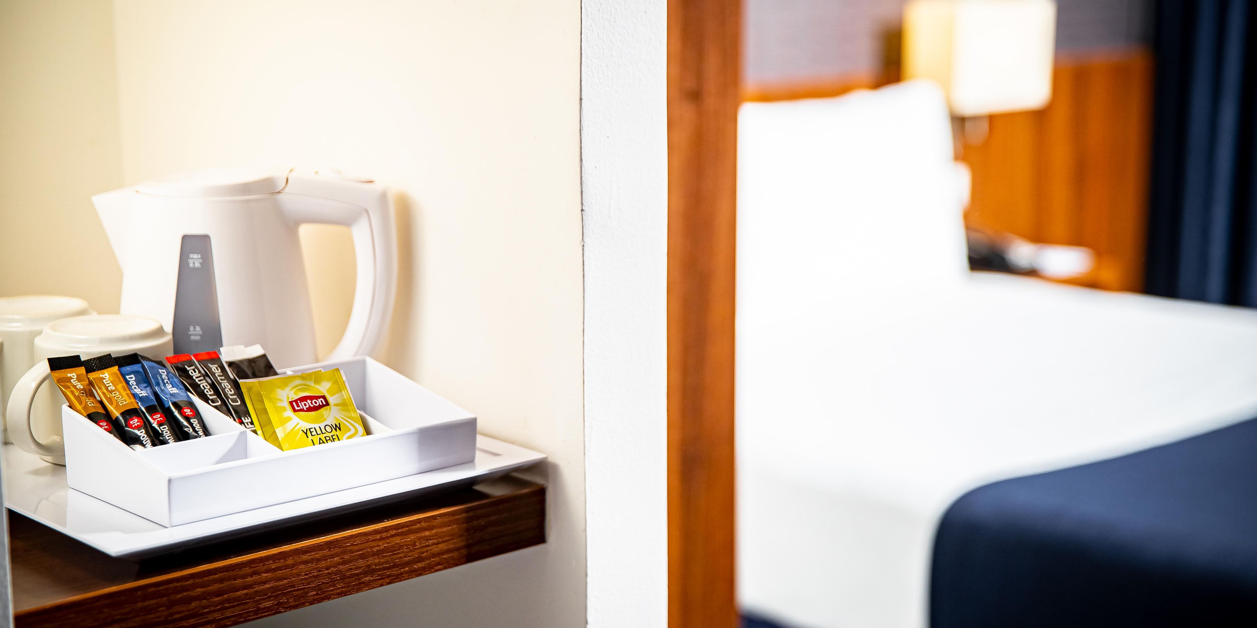 In our modern guest rooms, coffee and tea are available for you.