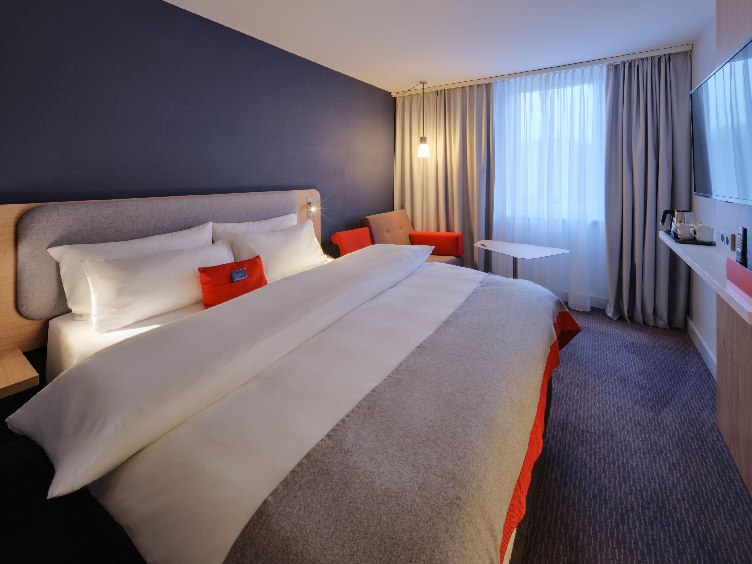Comfortable Queen Bed Guest Room with pull-out sofa bed