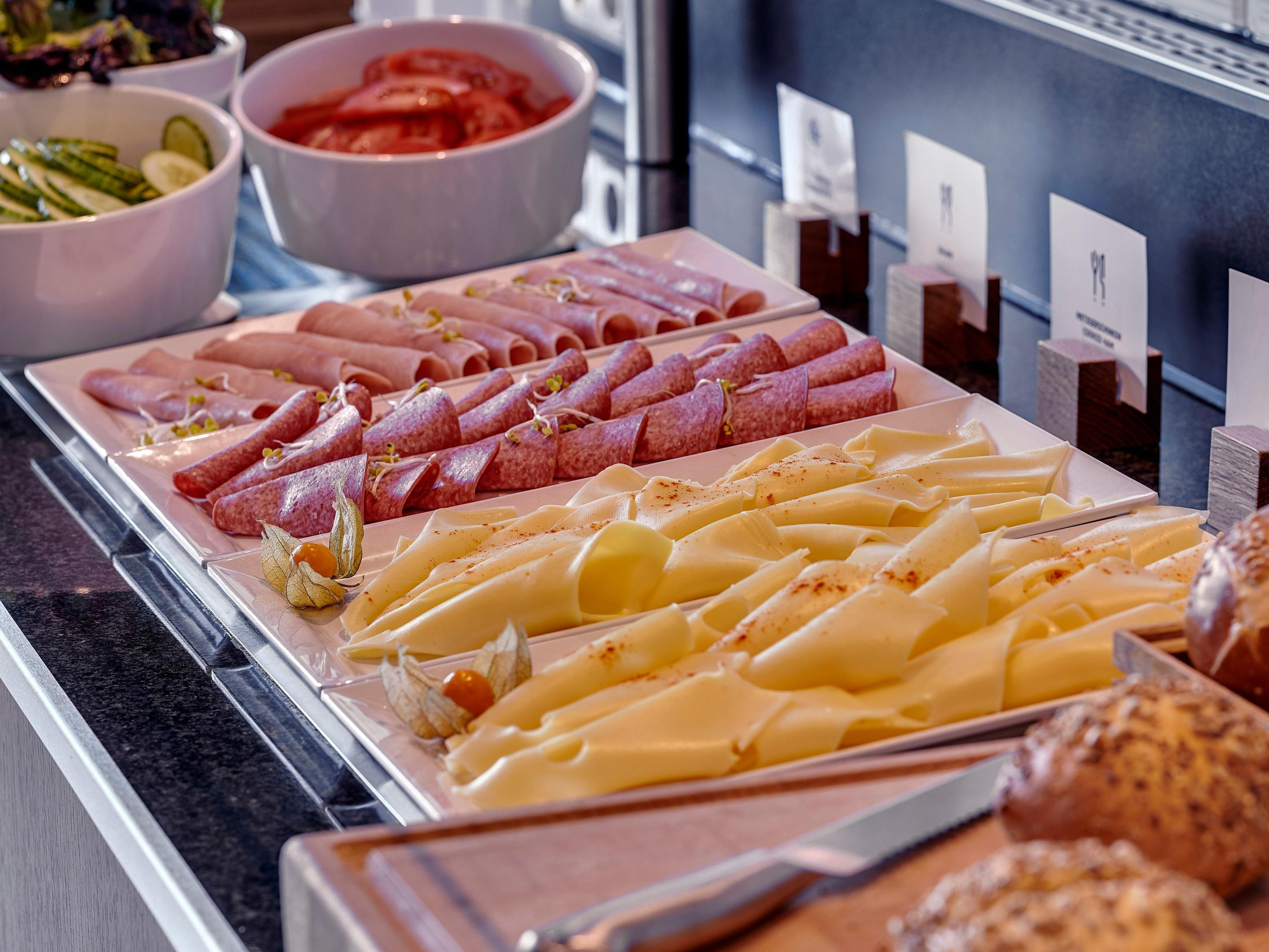 Head to the Great Room each morning for an included Express Start™ Breakfast. This continental buffet offers fluffy croissants and pastries, plus local cold cuts, eggs, cheeses and fresh fruit.