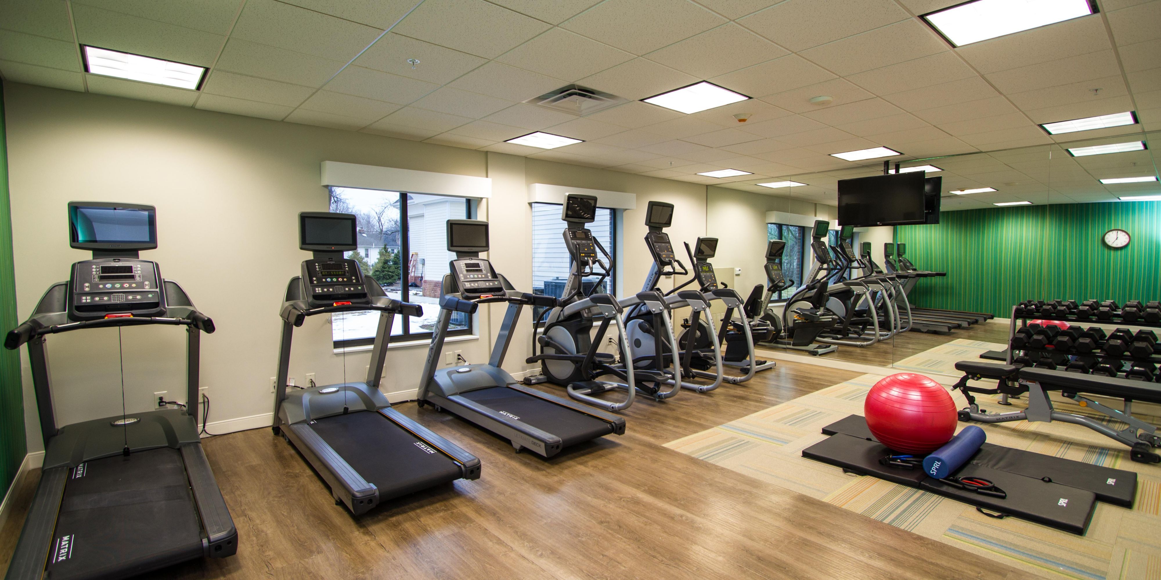 We are happy to provide a 24-hour Fitness Center with new equipment and free weights. Our large space includes a stretching area with full length mirrors.