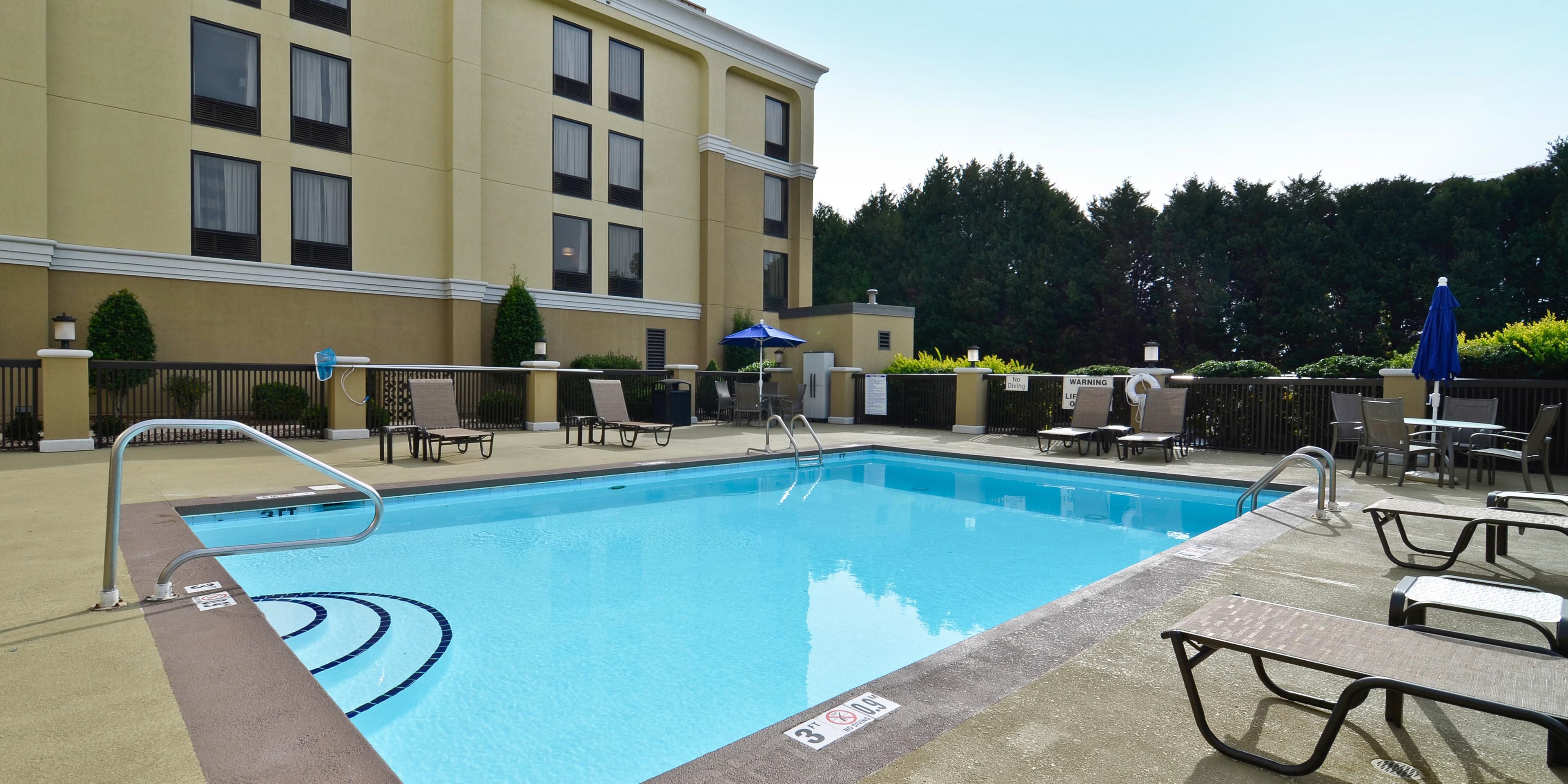 The outdoor pool at Holiday Inn Express in Burlington, NC is a refreshing oasis for guests to relax and unwind. With plenty of lounge chairs and umbrellas, guests can enjoy a day in the sun or take a refreshing dip. The pool is open seasonally and is a great way to cool off during the hot summer months.