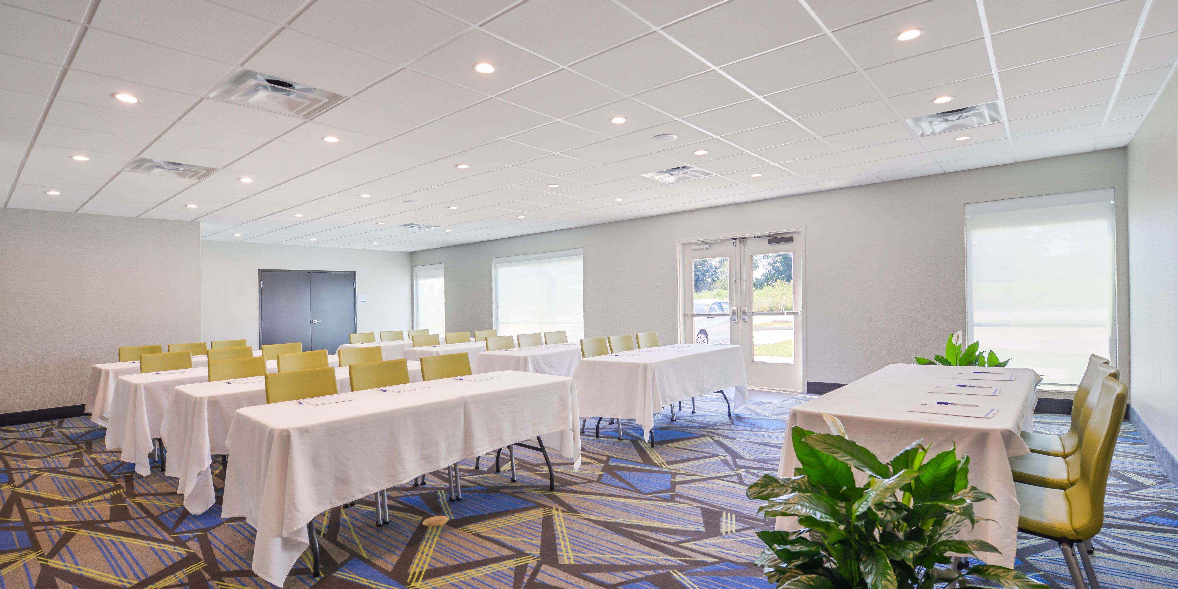 Host your next party, reunion, training class, or event in our Meeting Room.  A comfortable, spacious room equipped to accommodate up to 50 people with numerous seating styles available.  Enjoy your own A/V on our generous-sized television available for hookup.  926 square feet await your group!