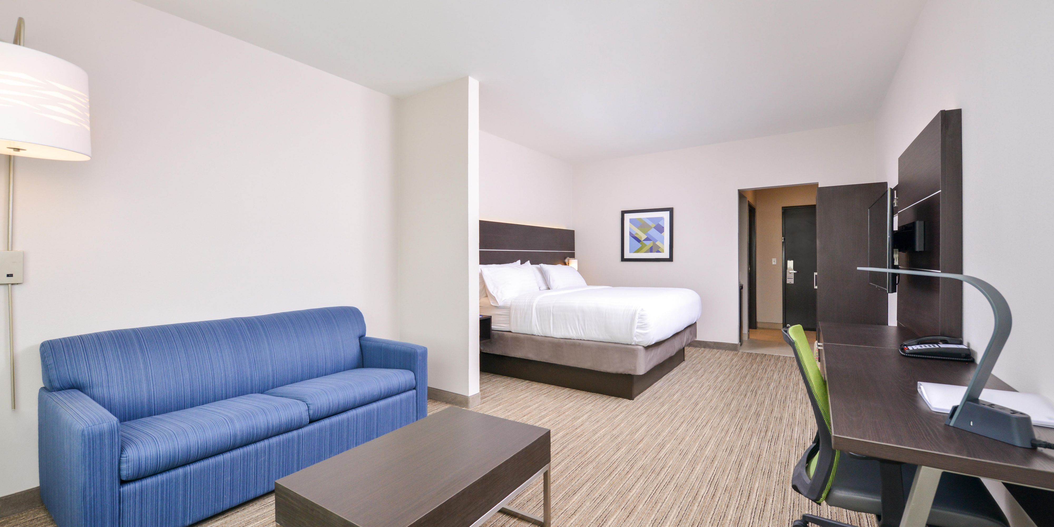 Treat yourself to extra space during your stay with a King Suite. A sofa sleep anchors the extra living space giving you the option to relax around the coffee table taking in your big picture window view or accommodate extra people using it as a bed. Suite layout available with two Queen beds also. 