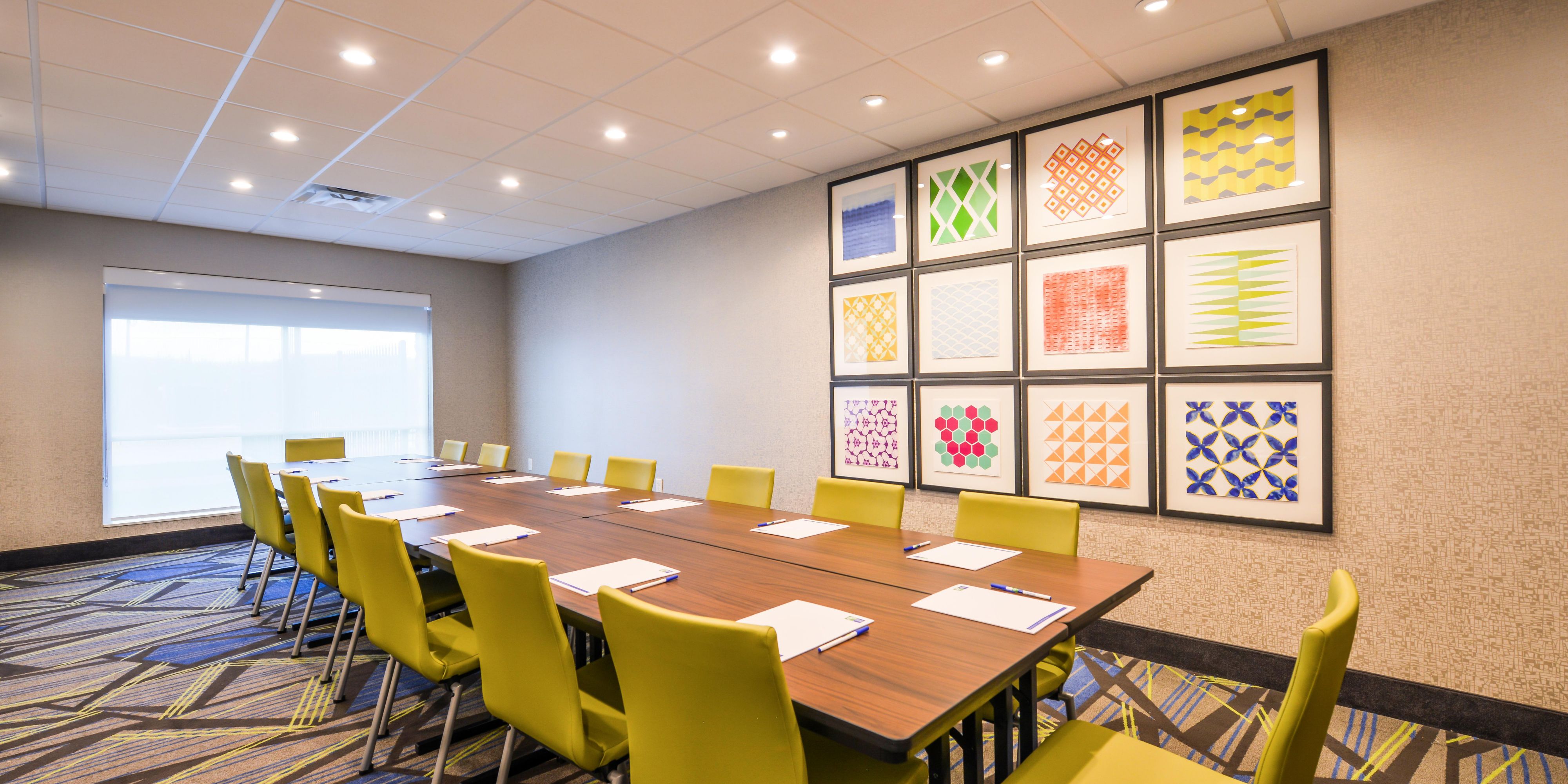 Whether it's a presentation or meeting, our Board Room is perfect to help you put your best foot forward.  Put your ideas on the big screen with an available television to connect to.  A large picture window pours natural light in while you control the view with the retractable shade. 300 square feet of space accommodates up to 20 guests.  