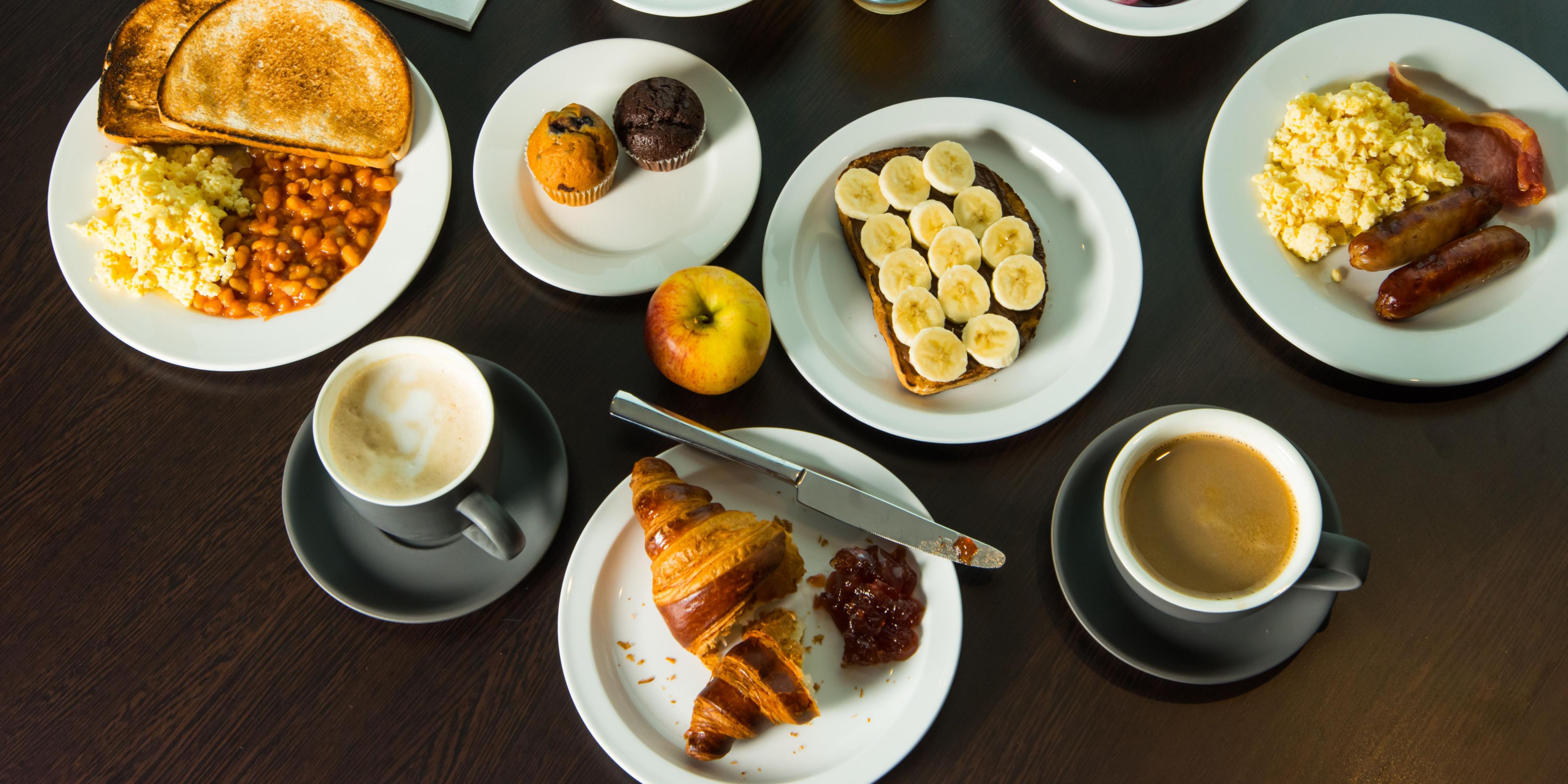 Kick-start your morning with our inclusive breakfast. Choose from a selection of hot and cold items like bacon, scrambled egg, sausages, toast, and pastries. Grab & go bags are available if you're in a hurry!
