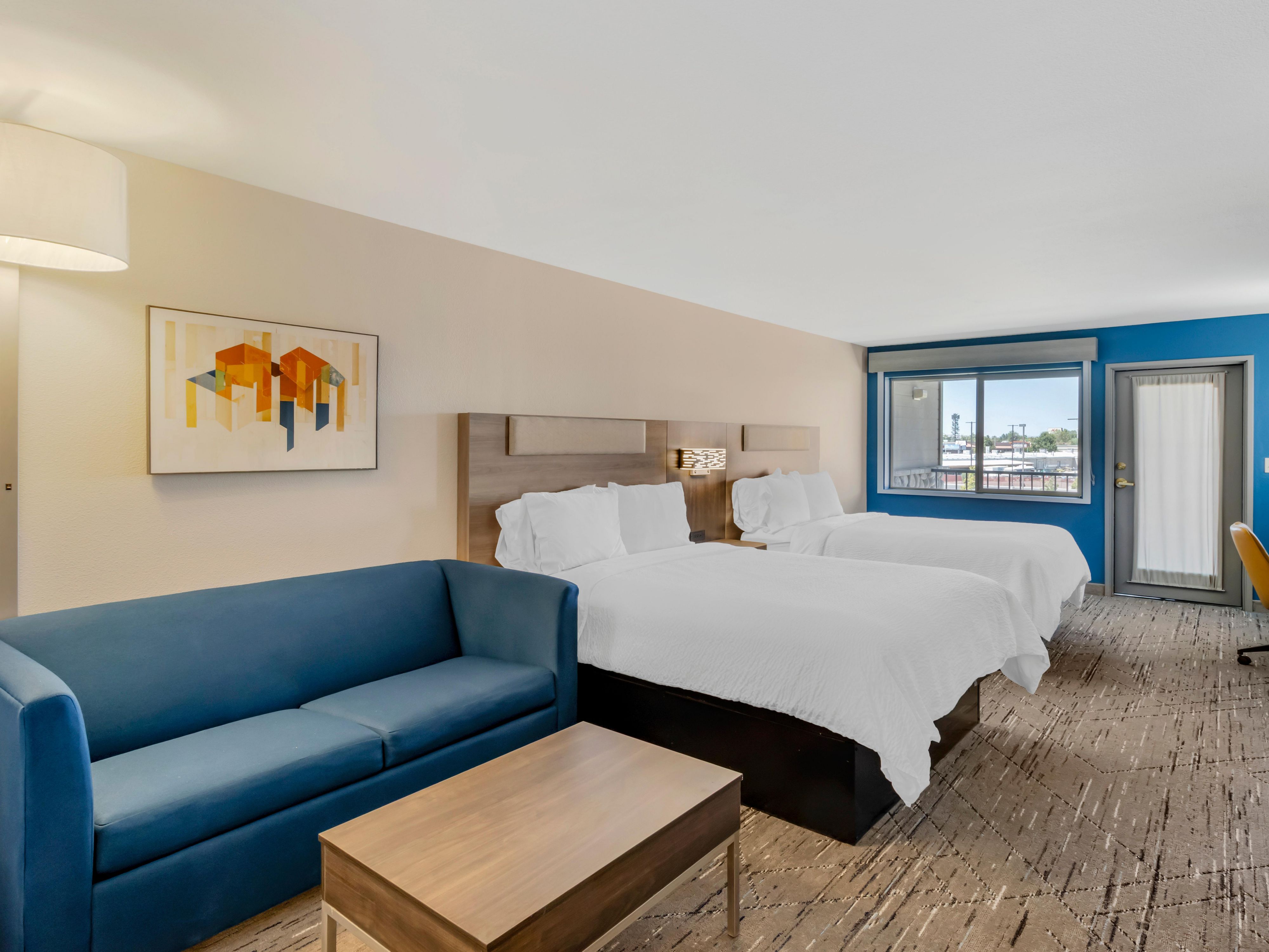 Two queen bed family suite with exterior patio