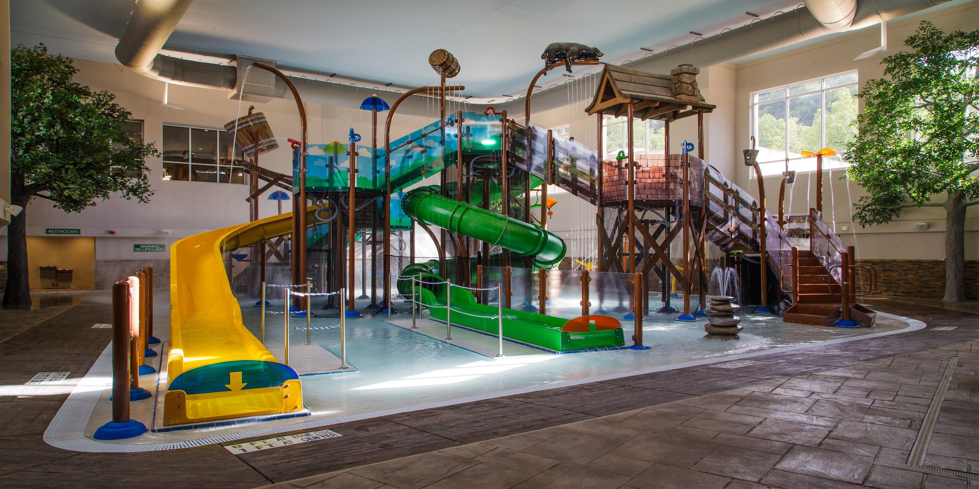 Enjoy our indoor all weather water-park including swimming pool, slides and kiddie splash pad.