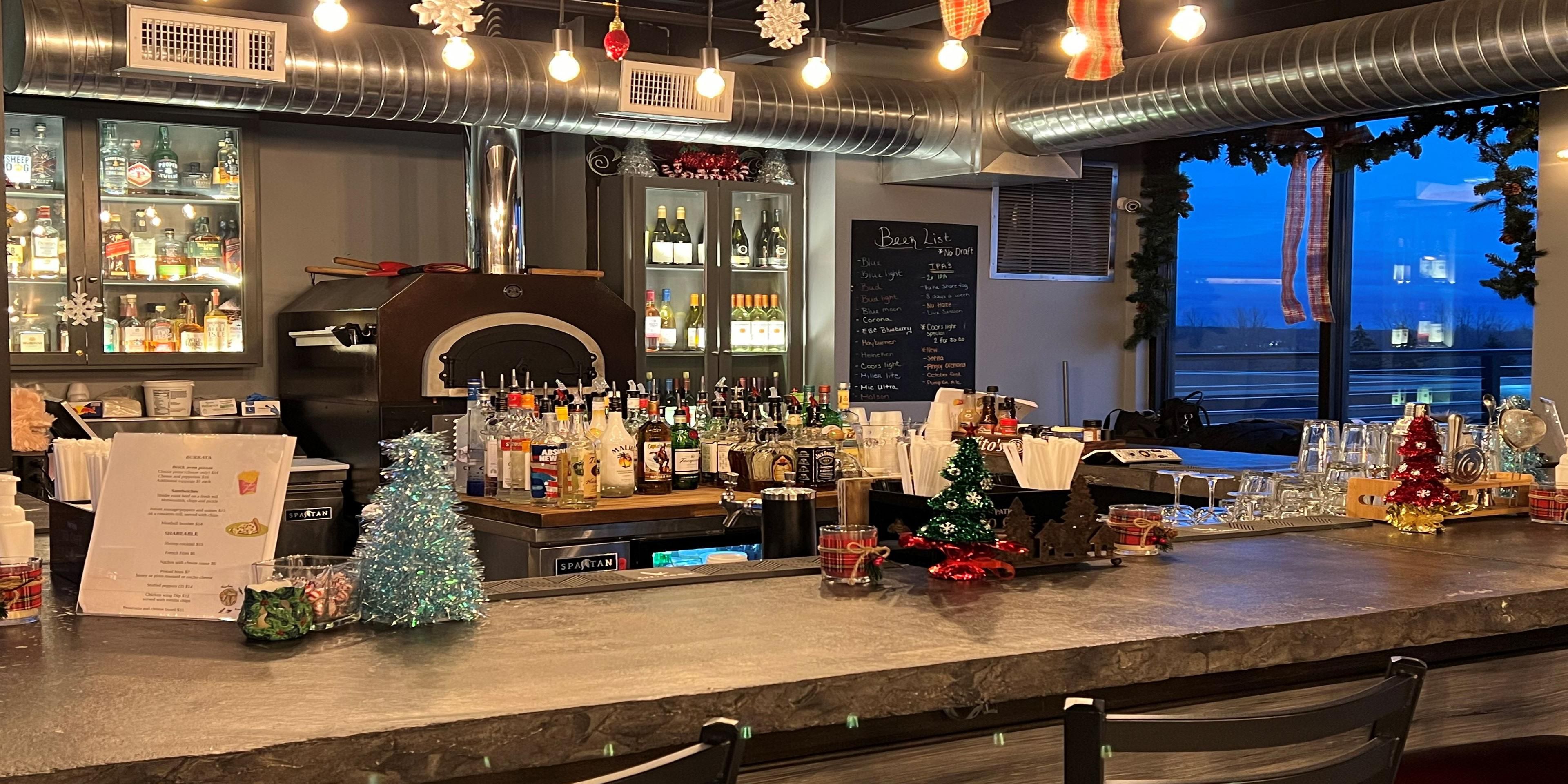 Located on the hotel rooftop with striking views of the area - Live music on Fridays - appetizers and light fare available and a full-service bar.