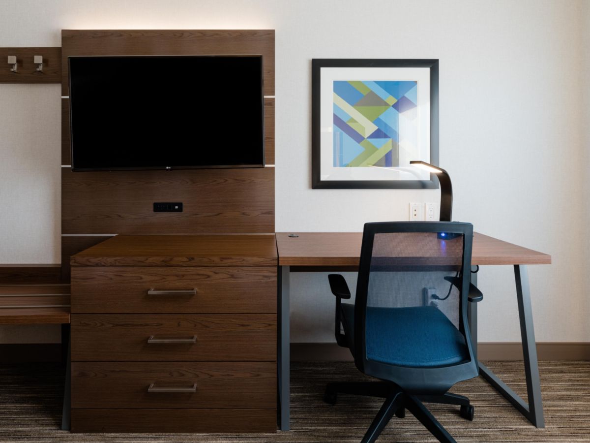 Modern guest room workspace with ergonomic chair at Holiday Inn Express Grande Prairie