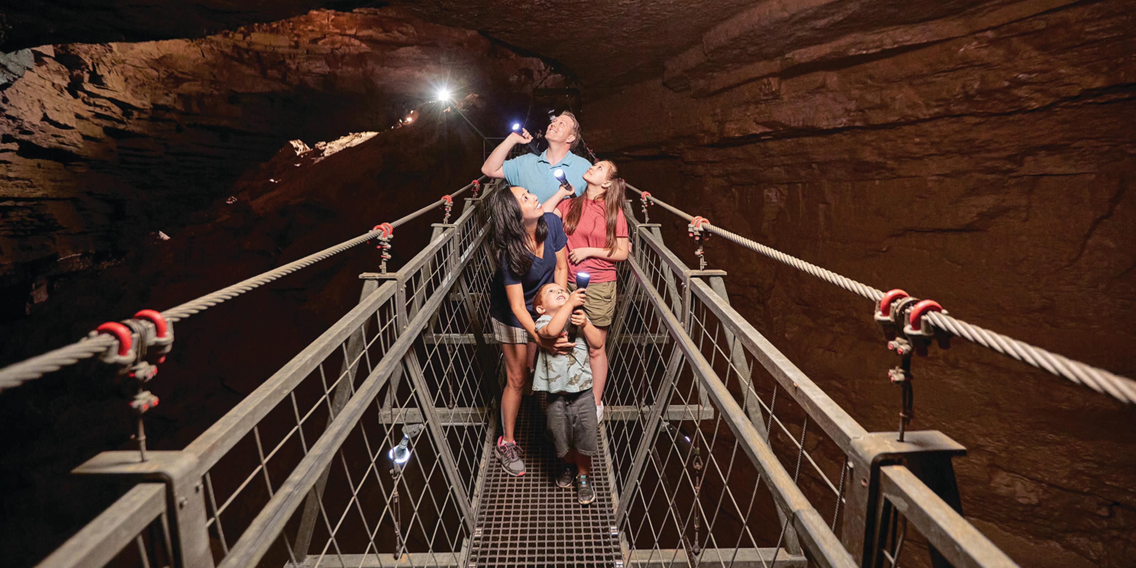 Descend over 100 ft below ground. Experience one of Kentucky’s largest cave entrances where two rivers flow over 100 feet below ground. Walk across the world’s longest underground swinging bridge and step up into Sunset Dome, one of the largest free-standing cave domes in the United States. Also included is admission to the American Cave Museum.