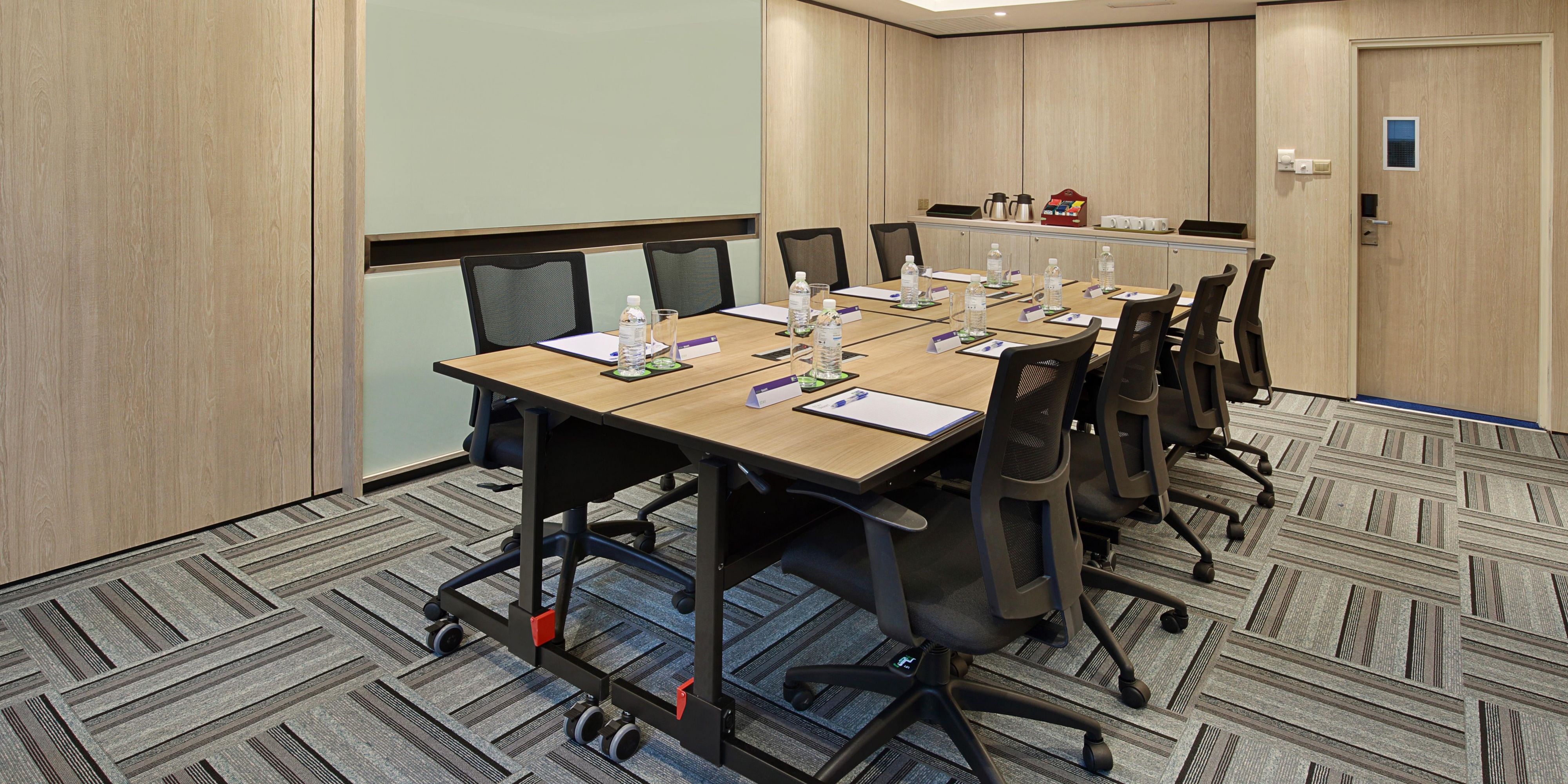 A cozy 8 persons Boardroom with natural daylight. Prepared with a projector, projection screen, writing board and free Wi-Fi to perform an ideal intimate meeting for our guests. For enquiries or booking, contact us at +603 2028 8888