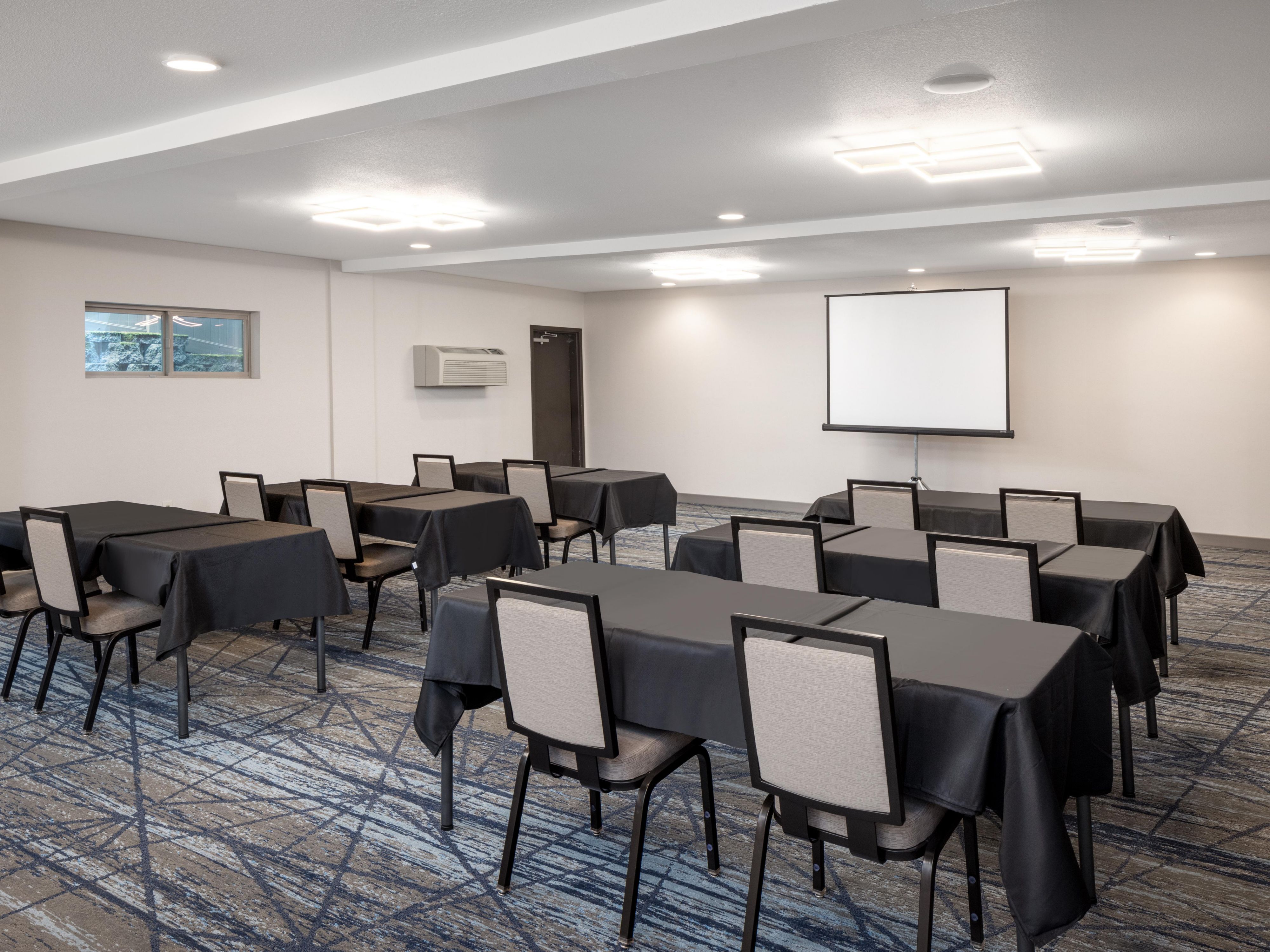 Host your event in our renovated Bridgeport and Sherwood Rooms, accommodating up to 100 guests. Enjoy modern business services, complimentary Wi-Fi, and customizable catering. Our hotel also offers a Fitness Center, Outdoor Pool, and garden spaces for relaxation.