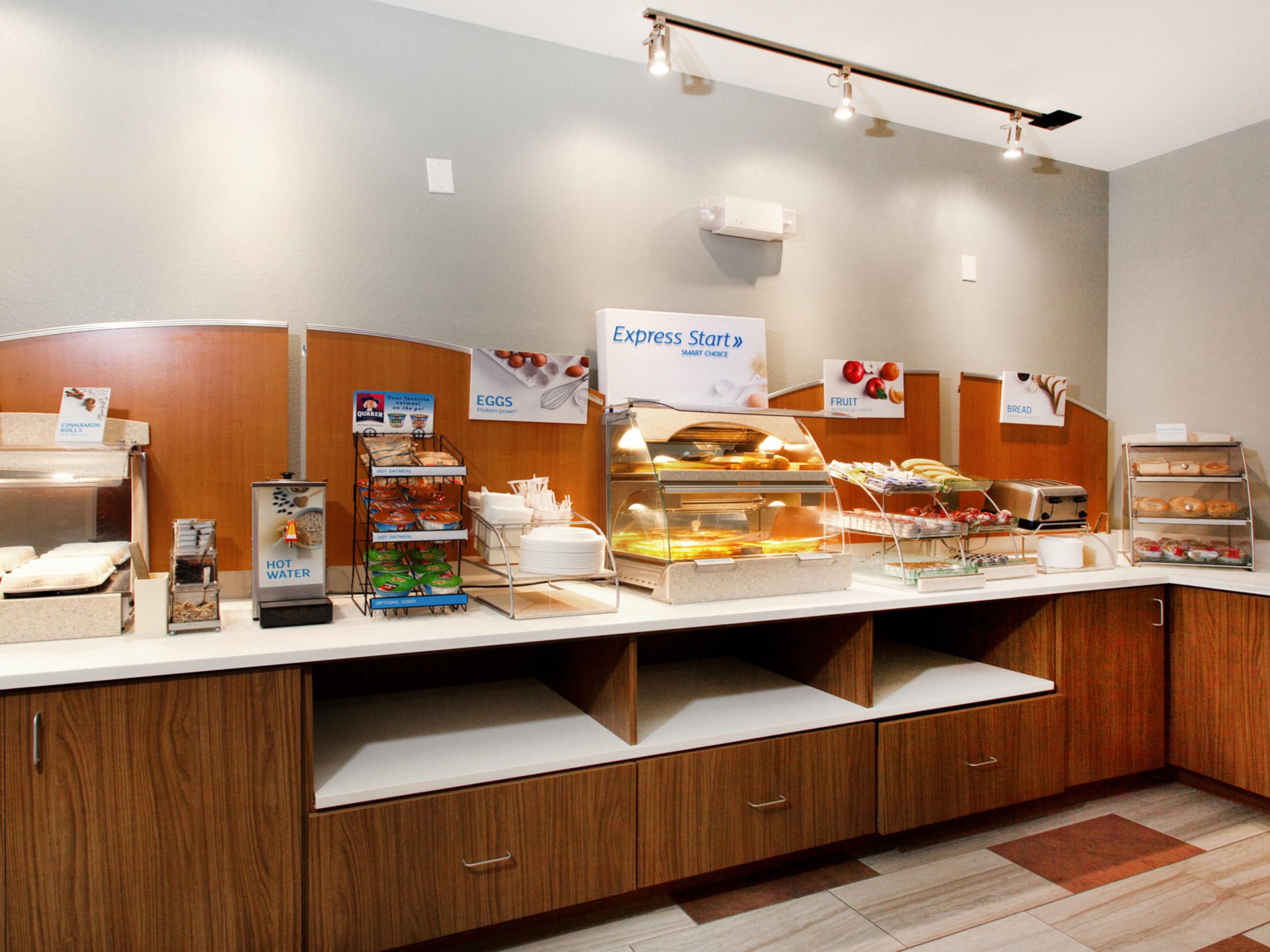 Relax and enjoy our buffet breakfast every morning in our comfortable lobby. Try our amazing cinnamon rolls or make a few pancakes with the touch of a button. Please try some of our tasty options for breakfast which consists of hot and cold items. Don't forget the coffee, juice, or milk. In a hurry, it's easy to grab a few items on your way out. 