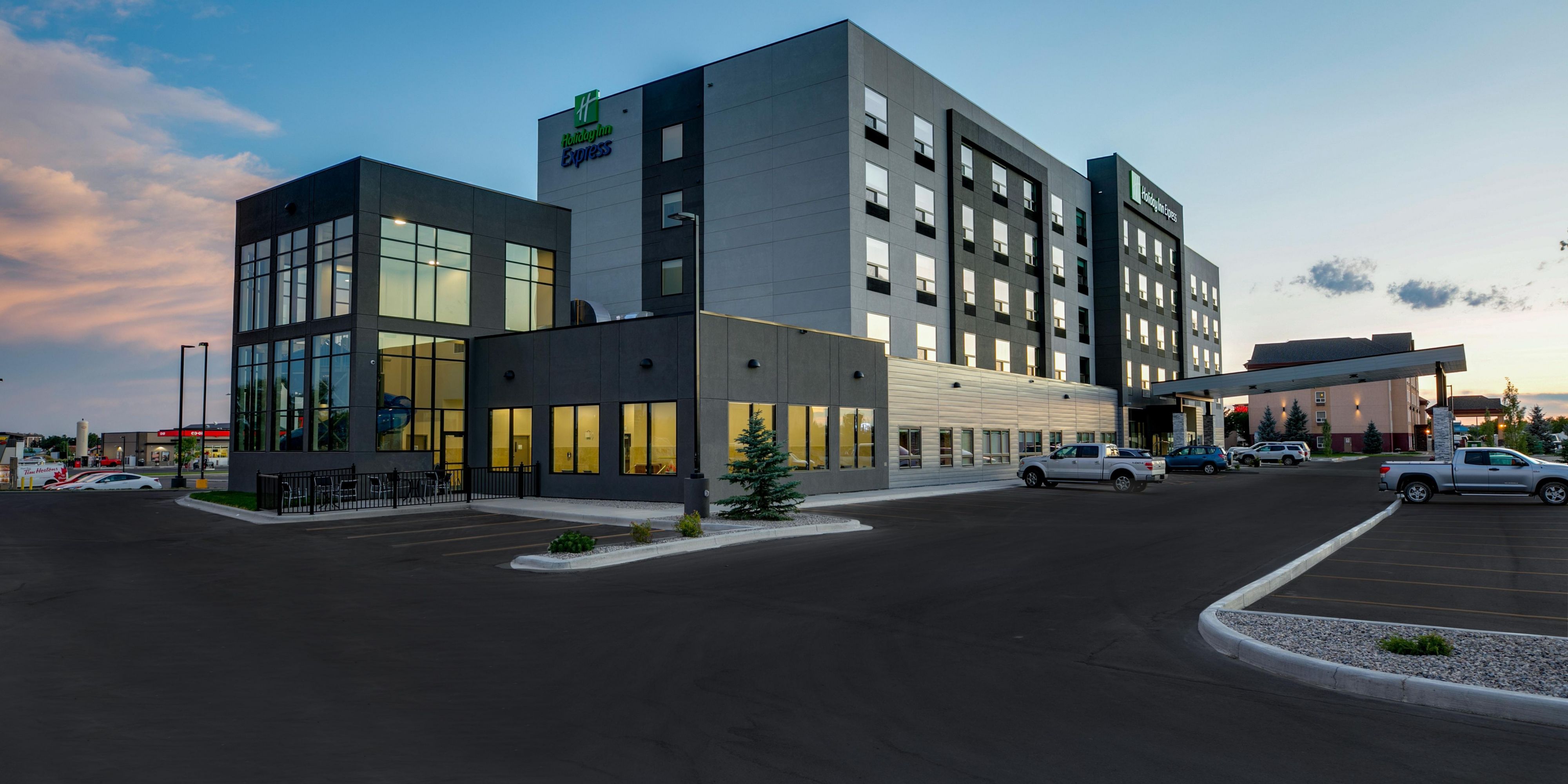 The Holiday Inn Express parking lot includes dedicated truck parking and plug ins at various locations around the lot.  For more information please contact the hotel directly.