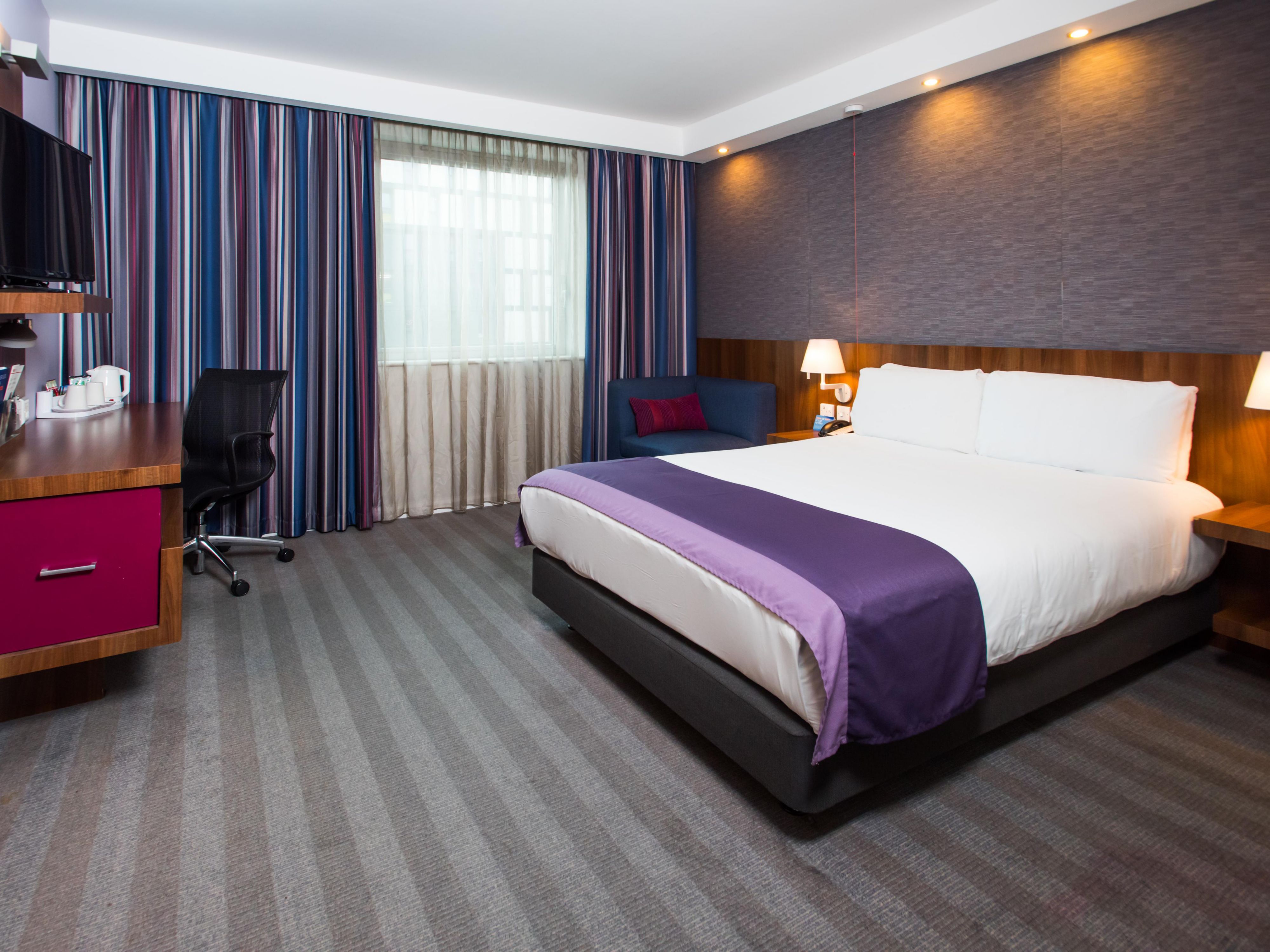 Busy day in Lincoln? Unwind in your comfy room with free Wi-Fi.