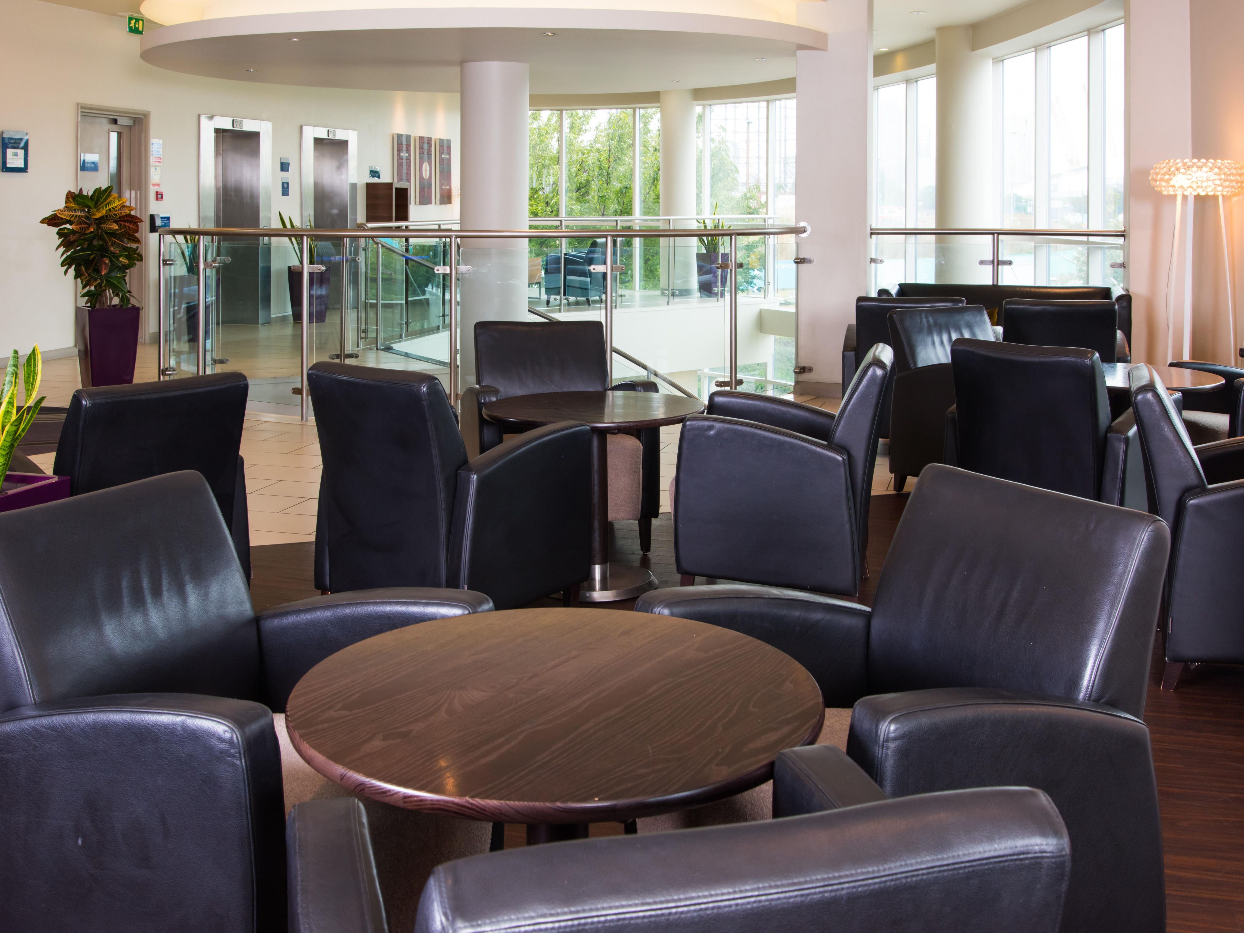 Relax with a drink in the lounge overlooking The O2 Arena.