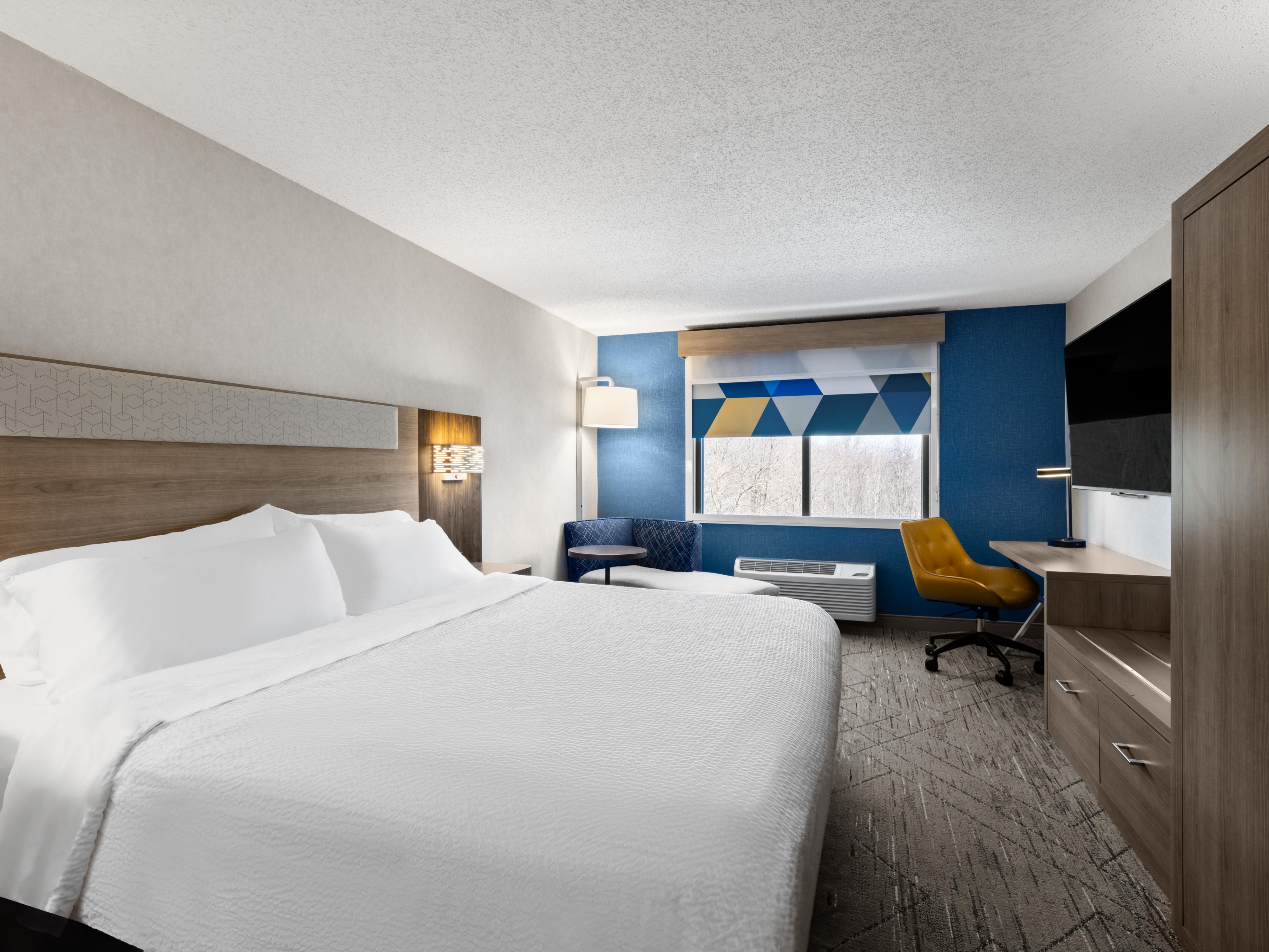 Single King standard guestroom with mini fridge and microwave