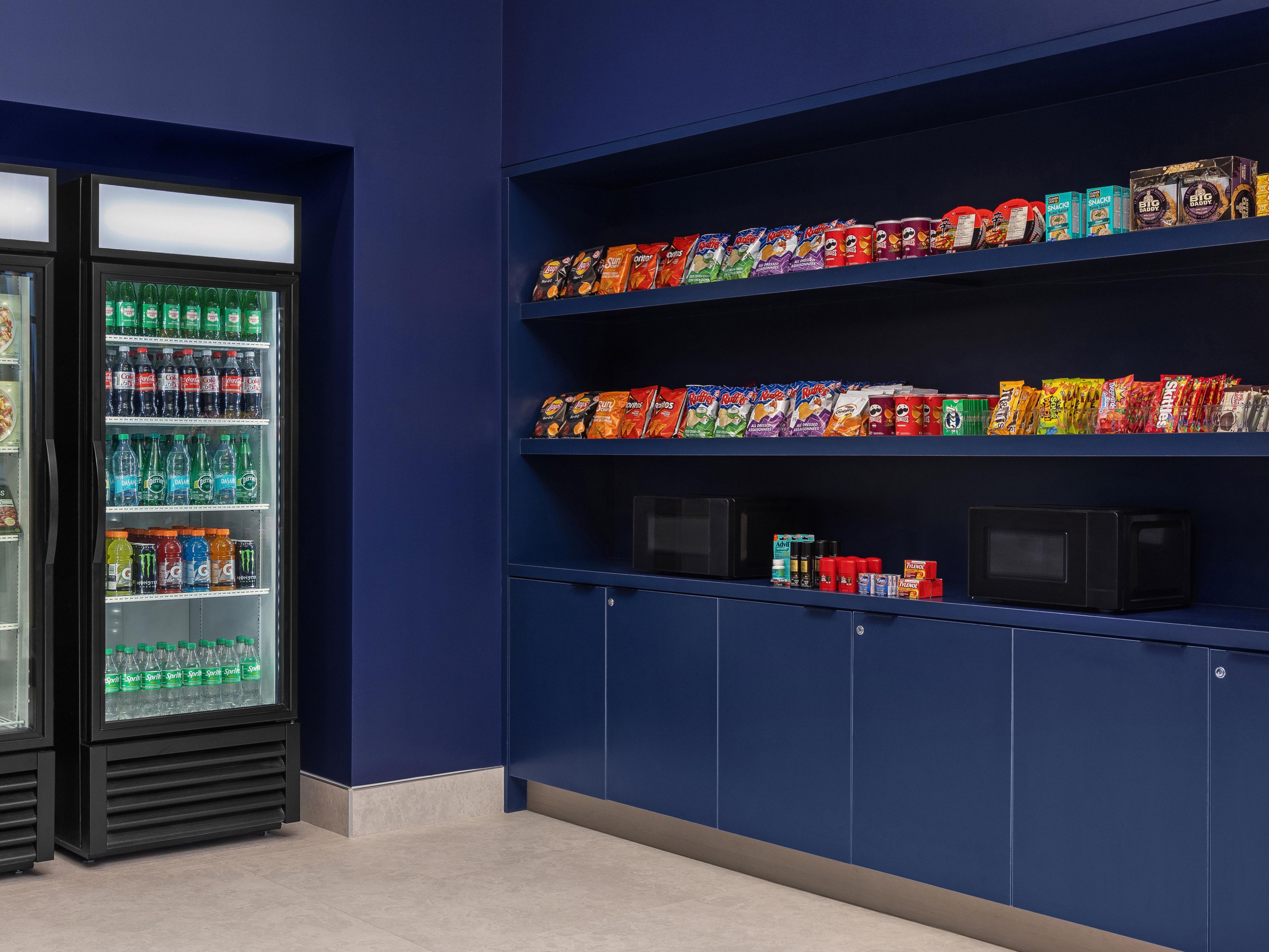 Still feeling hungry or forgot something? Visit our 24/7 hotel market for a variety of snacks, non-alcoholic beverages, frozen meals, and travel essentials, all available for purchase. Conveniently stocked to satisfy cravings anytime, day or night.