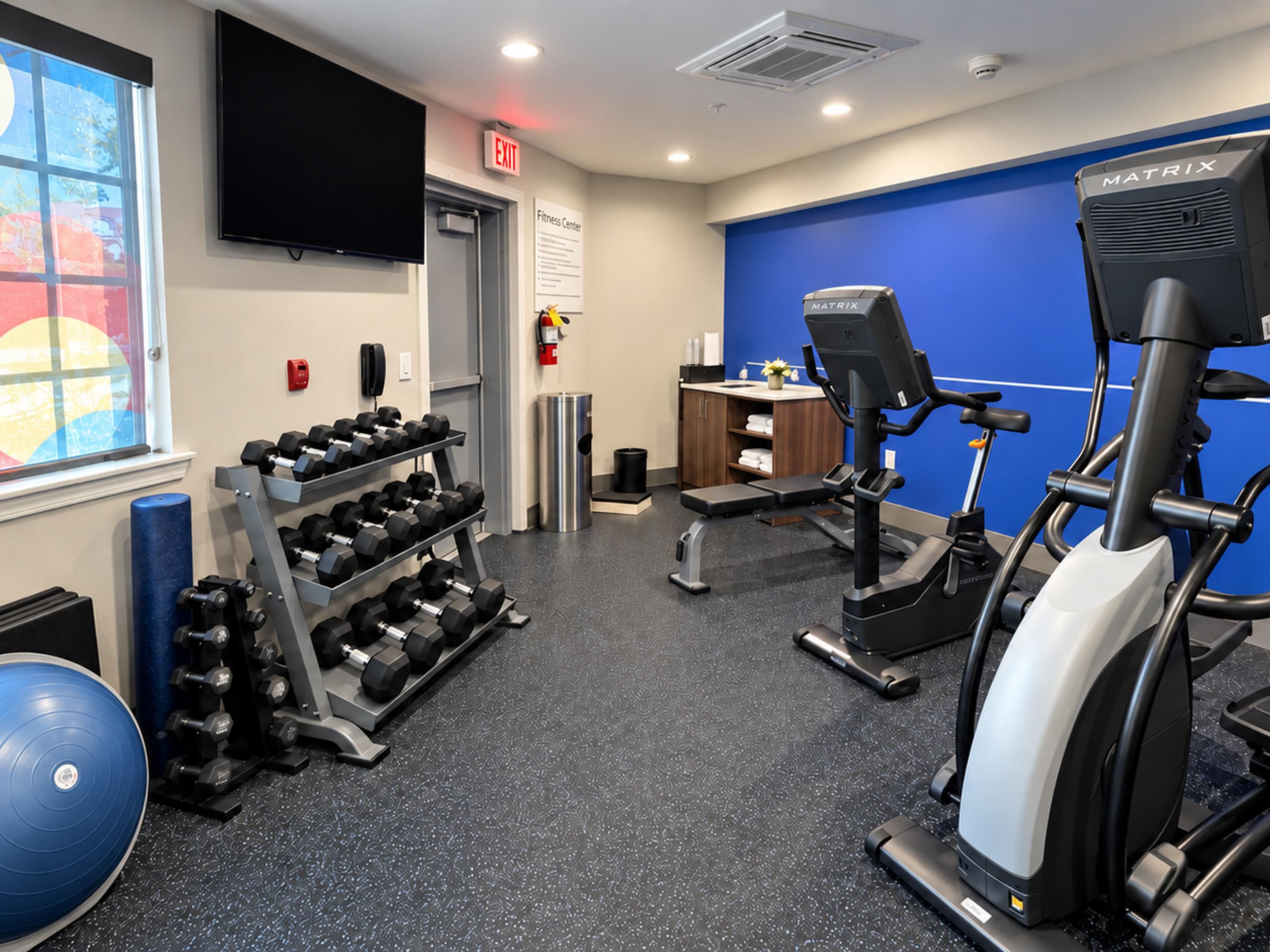 Fitness center with cardio equipment and free weights