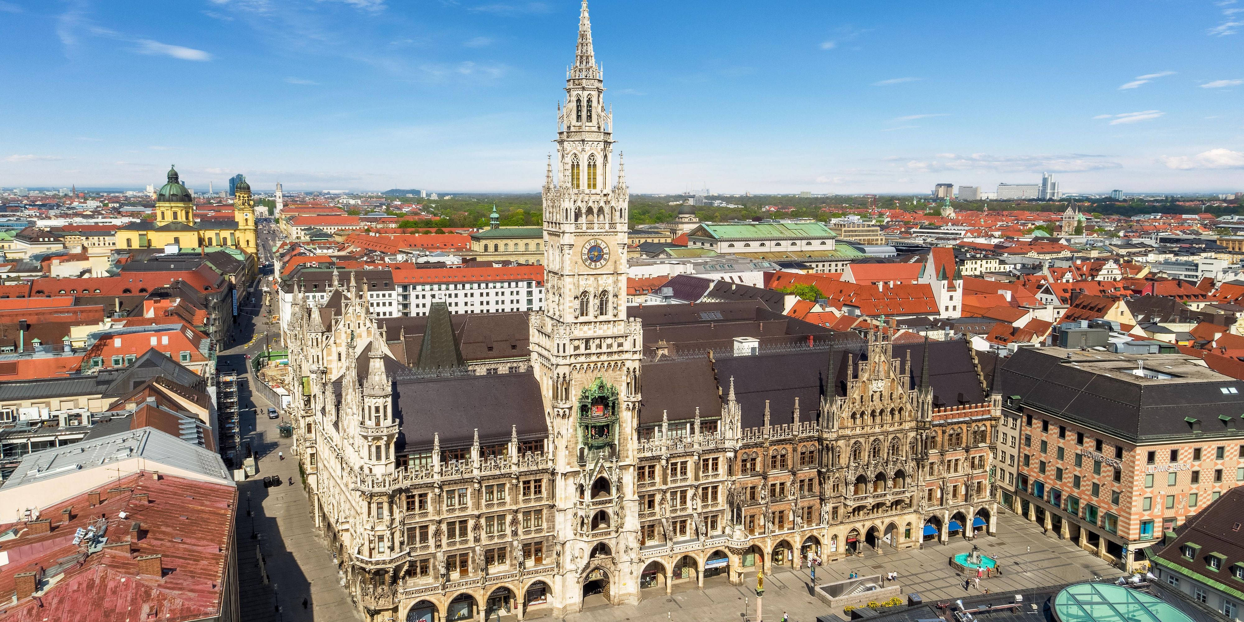 With its ornate, Neo-Gothic facade, the Neues Rathaus (New Town Hall) at Marienplatz (square) looks slightly older than it actually is. One of the most important attractions is the Glockenspiel in the hall's tower, whose daily performances attract audiences from around the world. The Theatinerkirche can be seen in the background on the left.