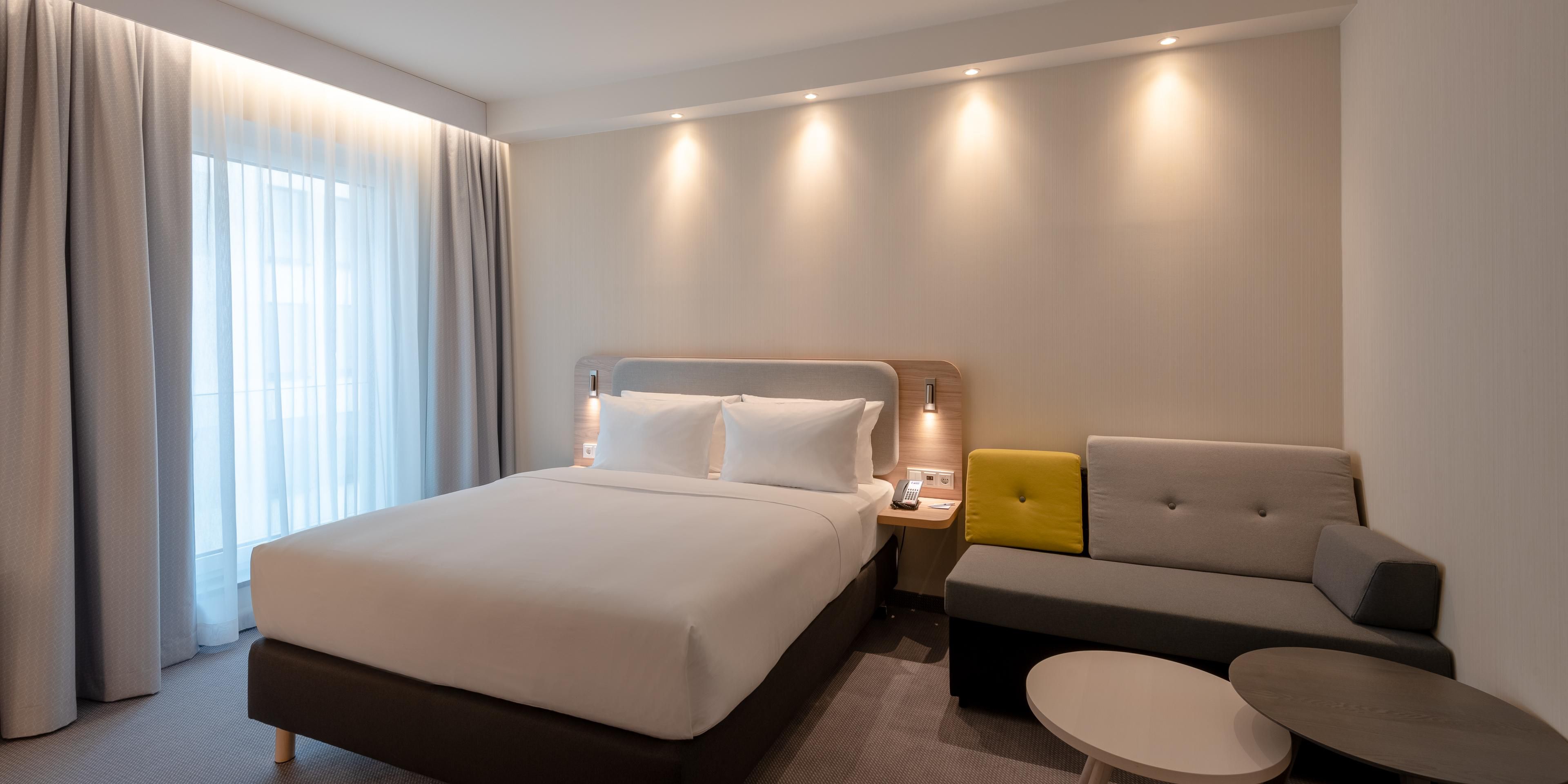 Come and enjoy our family rooms for an experience in Munich. There’s space for you to unwind for up to two adults in this queen bedded room and one child or one adult to sleep in the double sofa bed. Our complimentary Wi-Fi internet will keep you connected. The room is equipped with air conditioning, and Flat screen TV.
