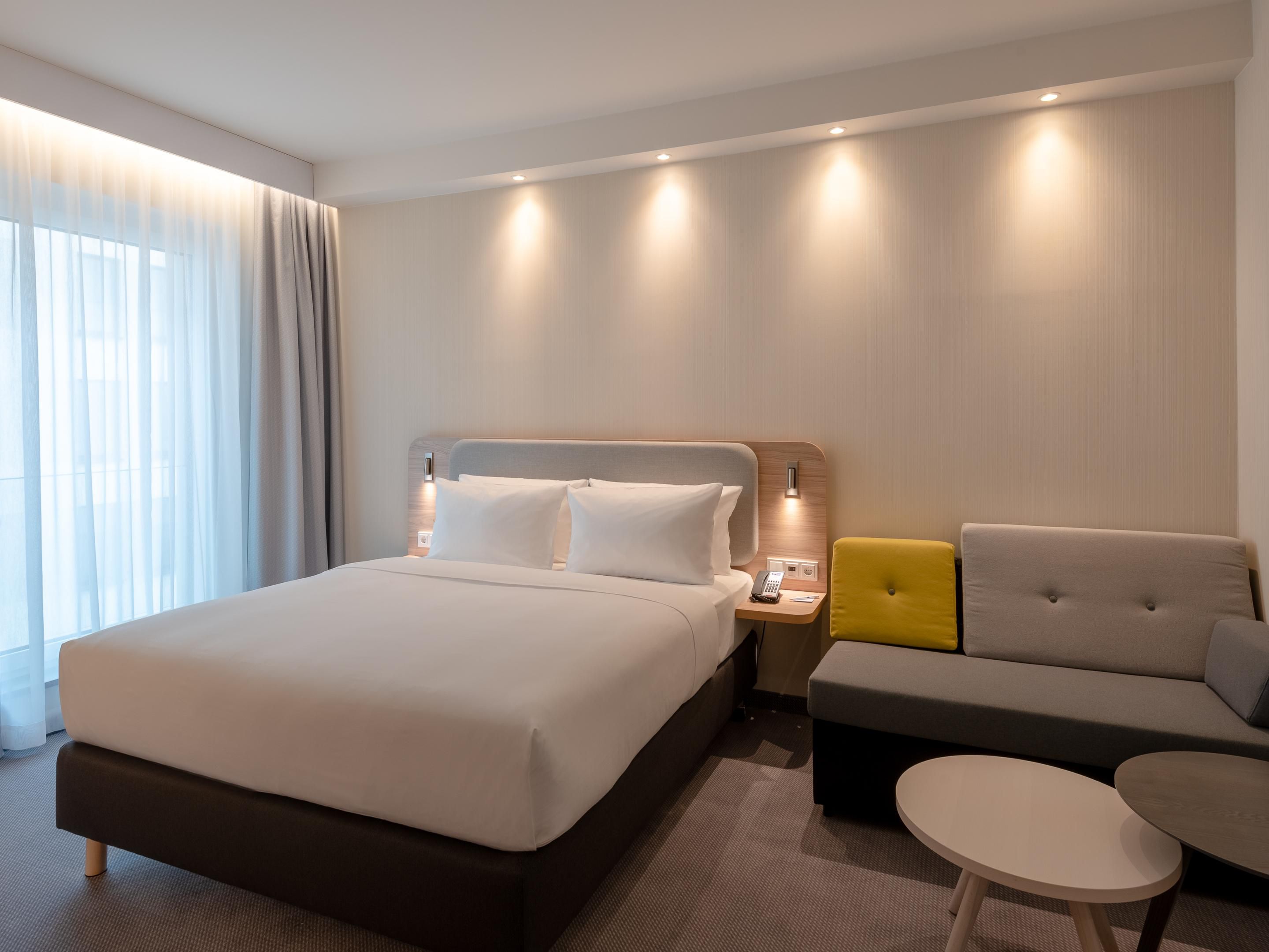 Come and enjoy our family rooms for an experience in Munich. There’s space for you to unwind for up to two adults in this queen bedded room and one child or one adult to sleep in the double sofa bed. Our complimentary Wi-Fi internet will keep you connected. The room is equipped with air conditioning, and Flat screen TV.