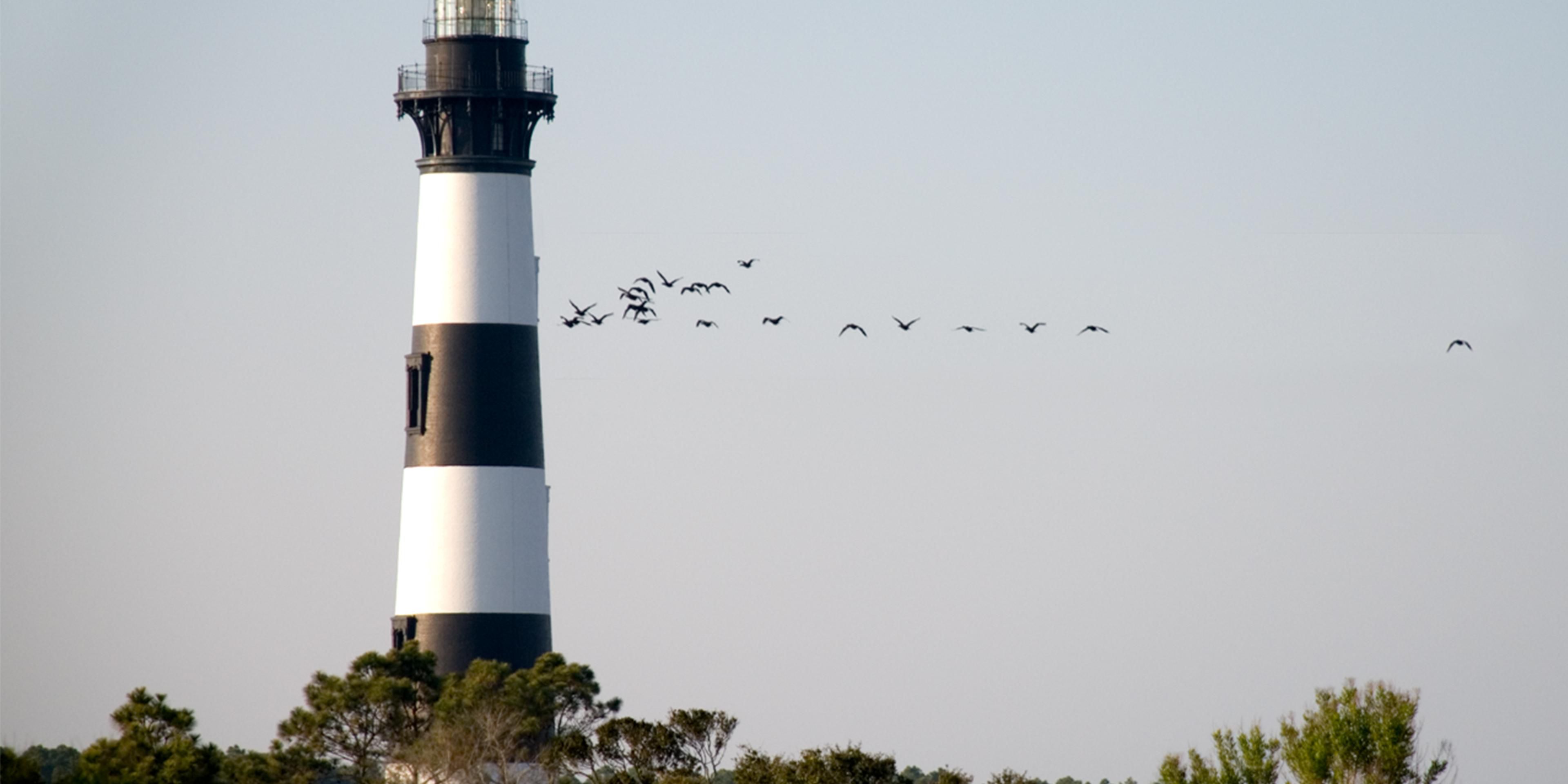 From Corolla to Ocracoke; the Five Outer Banks Lighthouses are historic landmarks and a must-see while visiting the OBX.
1. Cape Hatteras Lighthouse.  
2. Currituck Beach Lighthouse.  
3. Bodie Island Lighthouse.  
4. Roanoke Marshes Lighthouse.  
5. Ocracoke Lighthouse.