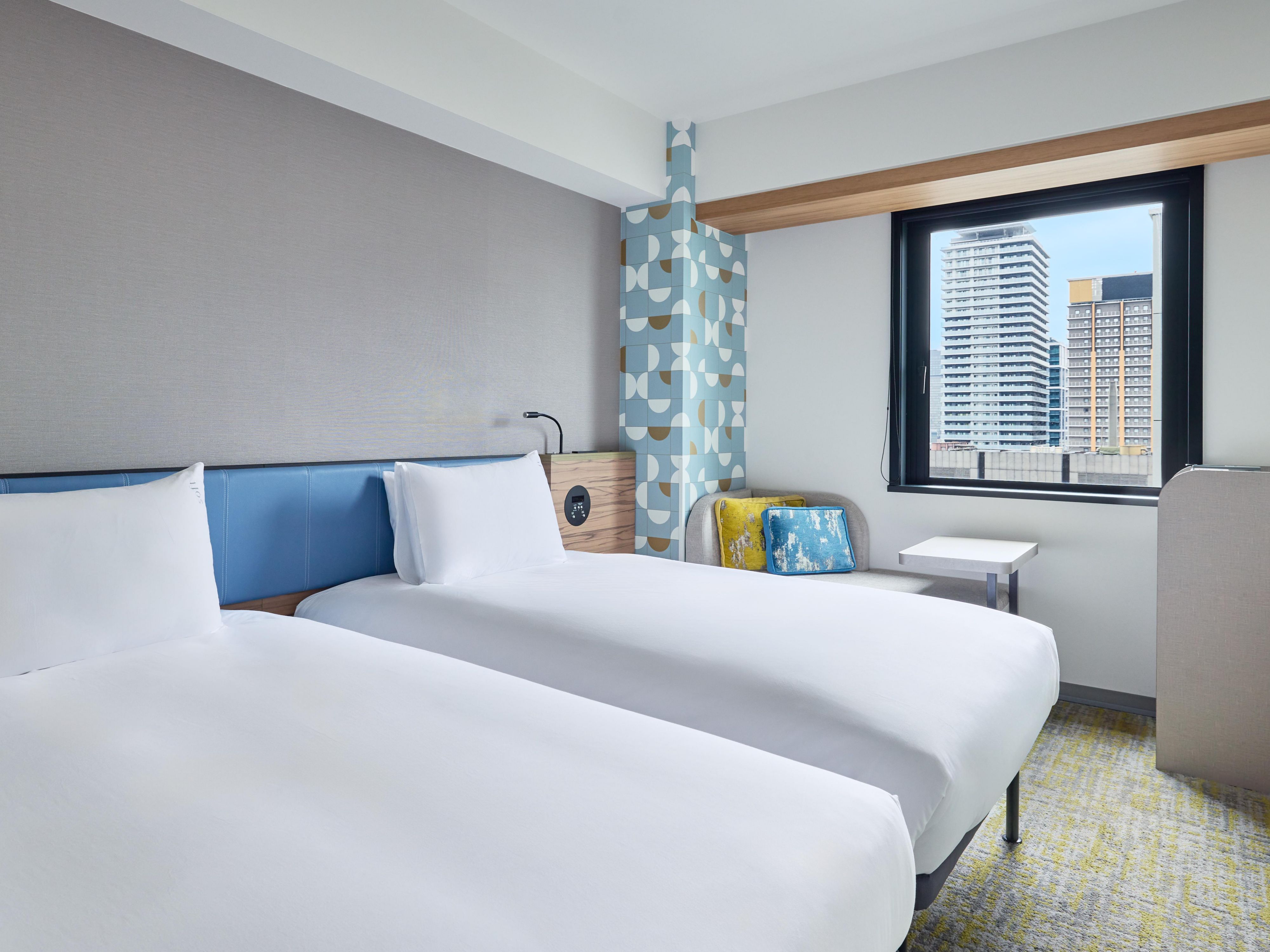 Relax in a High-Floor Premium Room with Osaka City View