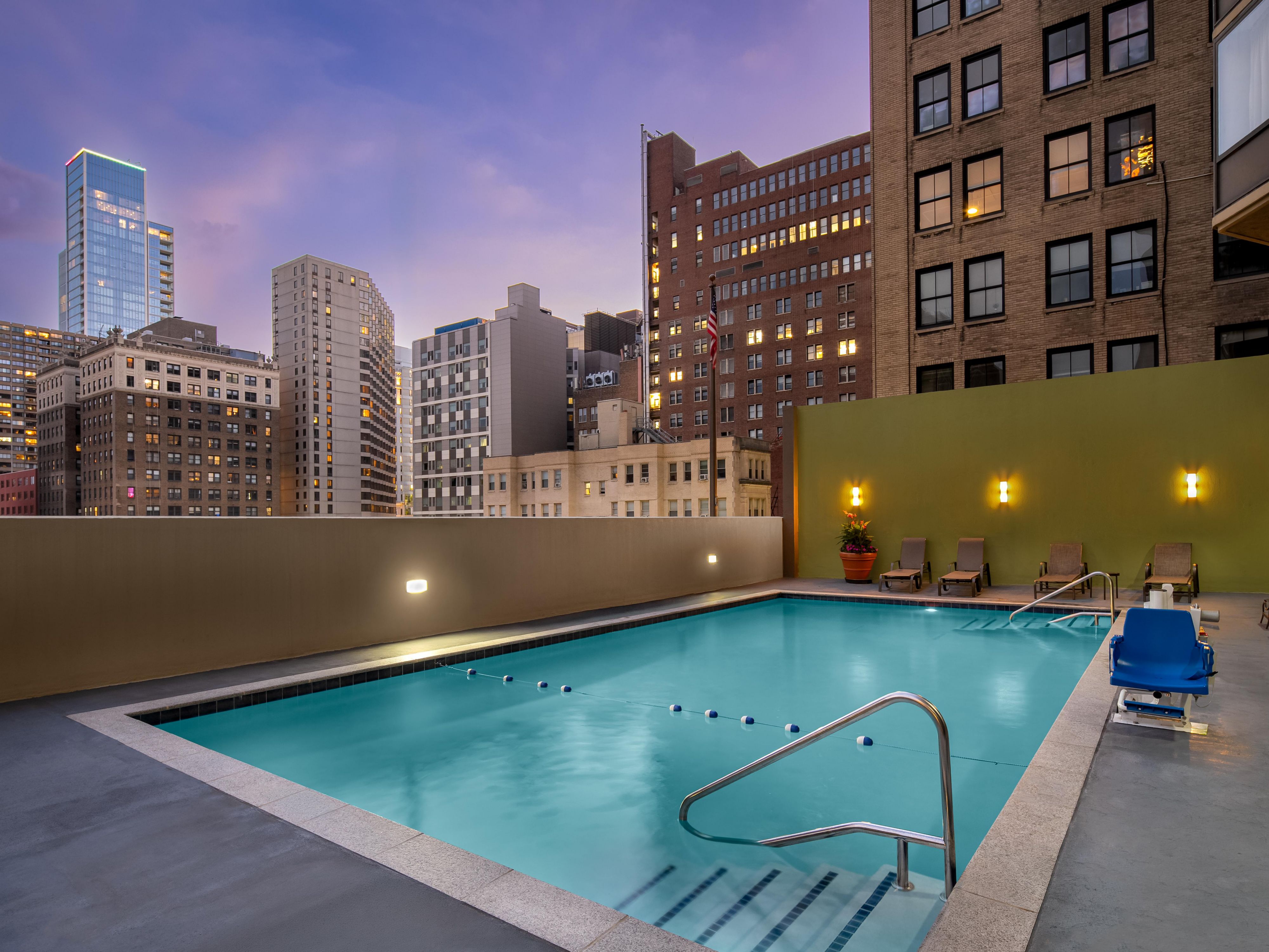 Outdoor swimming pool at dusk
