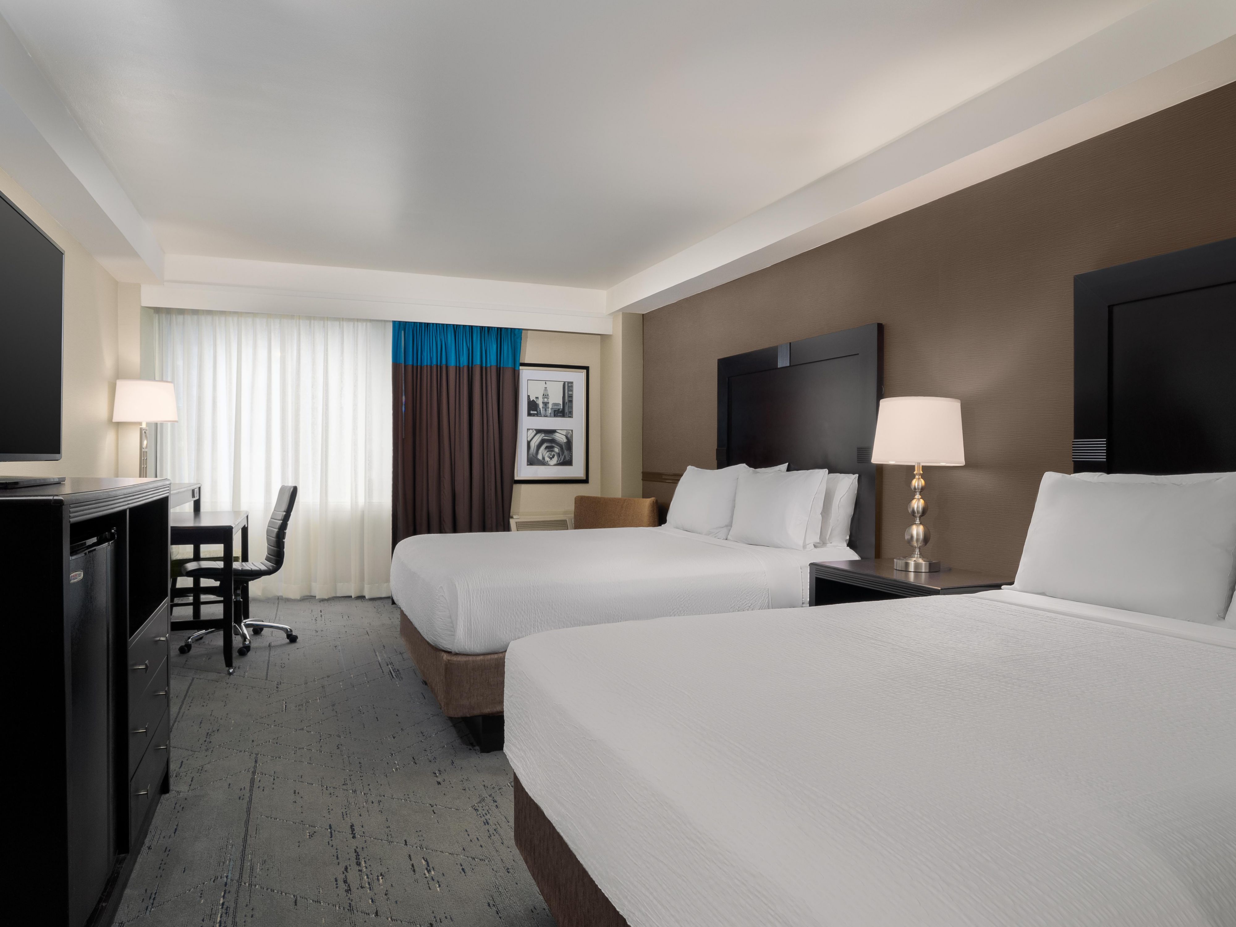 Standard guest room with two queen beds.